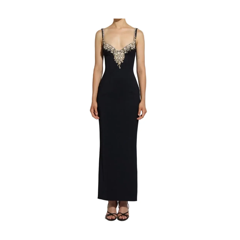 Black evening gown with intricate beading on a white background