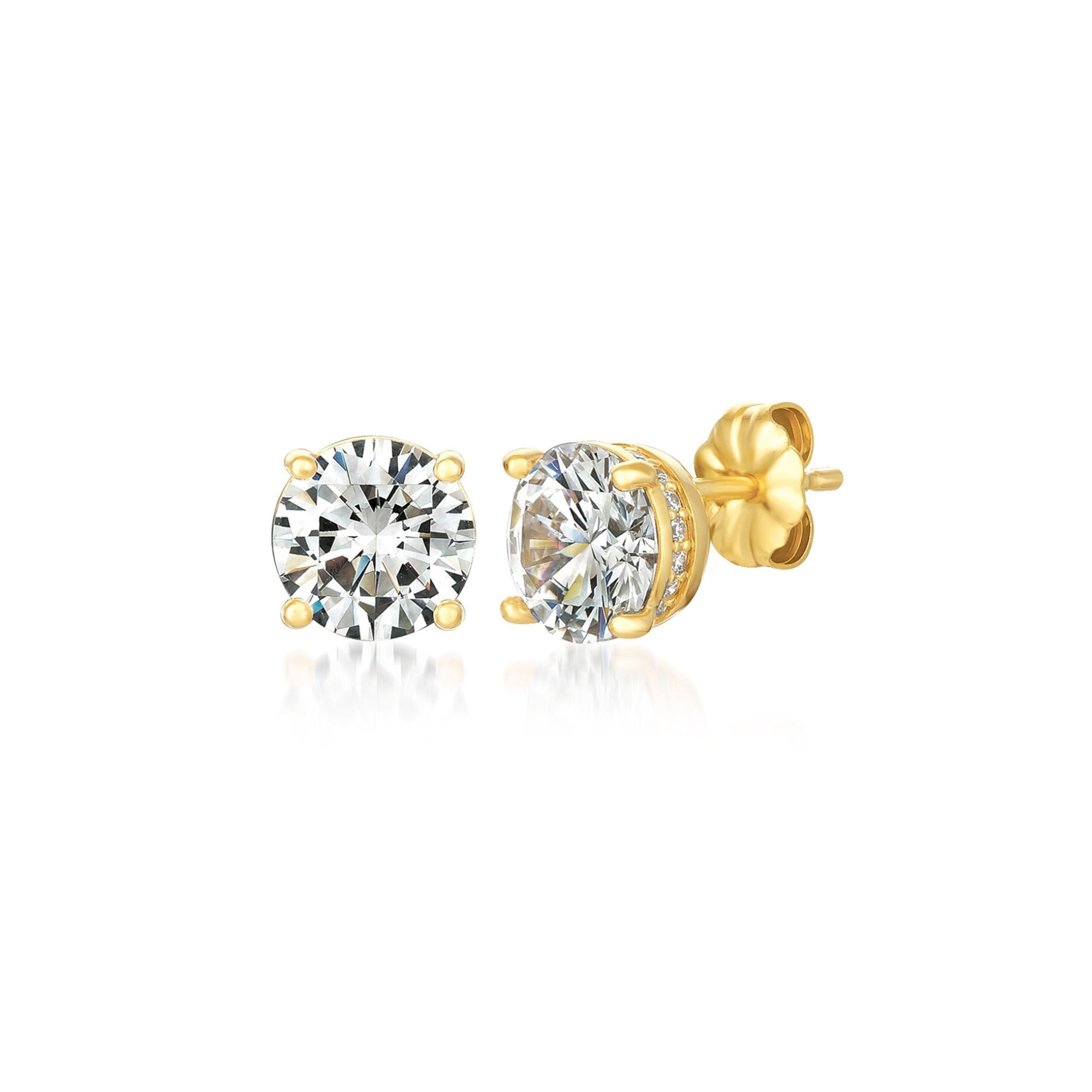 Pair of gold-toned stud earrings, each with a large round clear faceted stone in a four-prong setting and pavé side details.