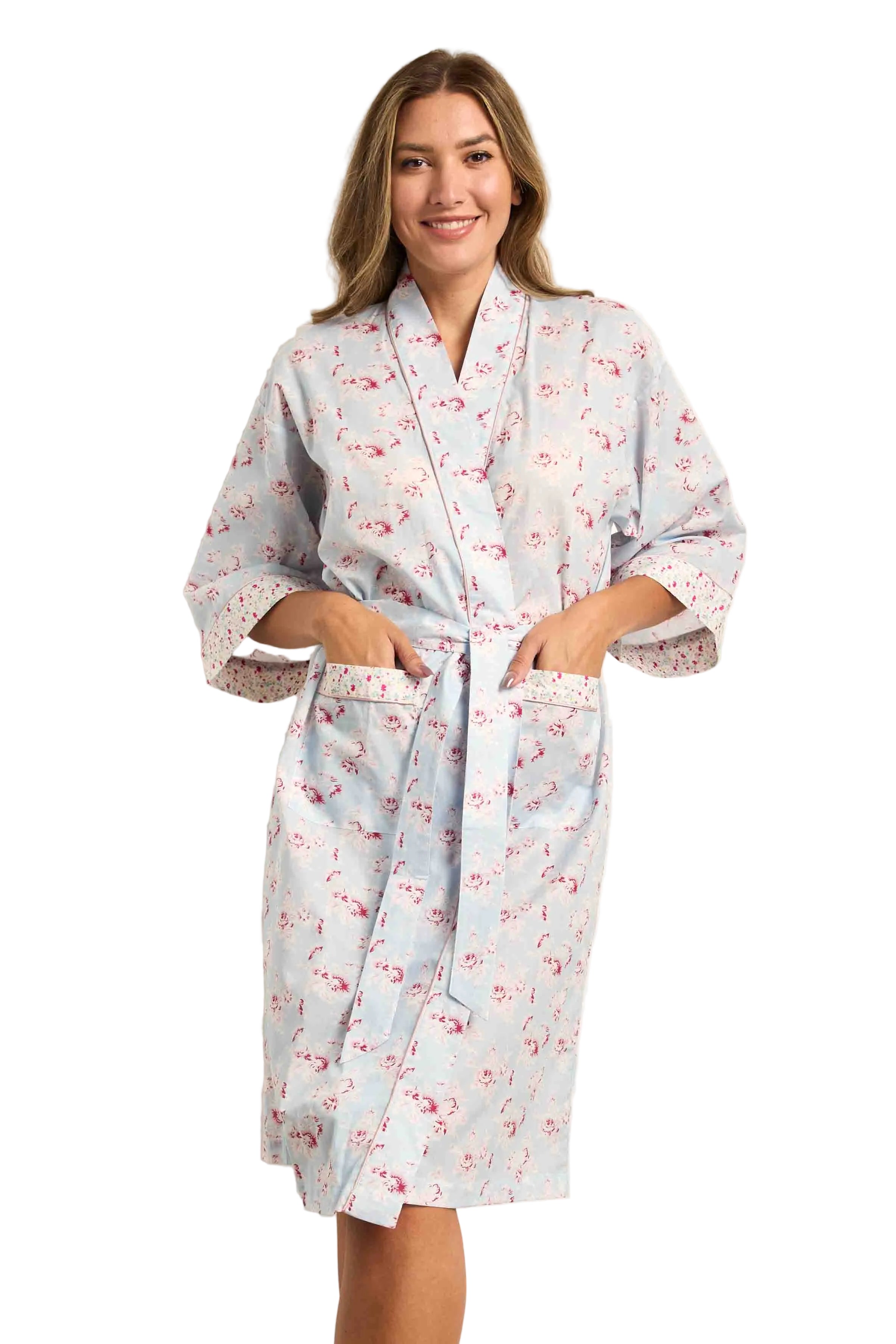 Light blue voile kimono wrapover robe with pink floral pattern, 3/4 sleeves, self-tie belt, and front pockets.