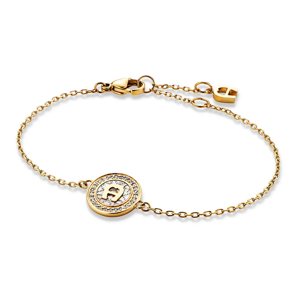 Gold-toned Aigner bracelet with a central circular charm featuring a white iridescent inlay, gold 'A' logo, and clear pavé st