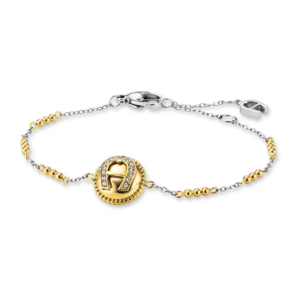 Gold-toned and silver-toned stainless steel bracelet with a central circular charm featuring a crystal-embellished Aigner hor