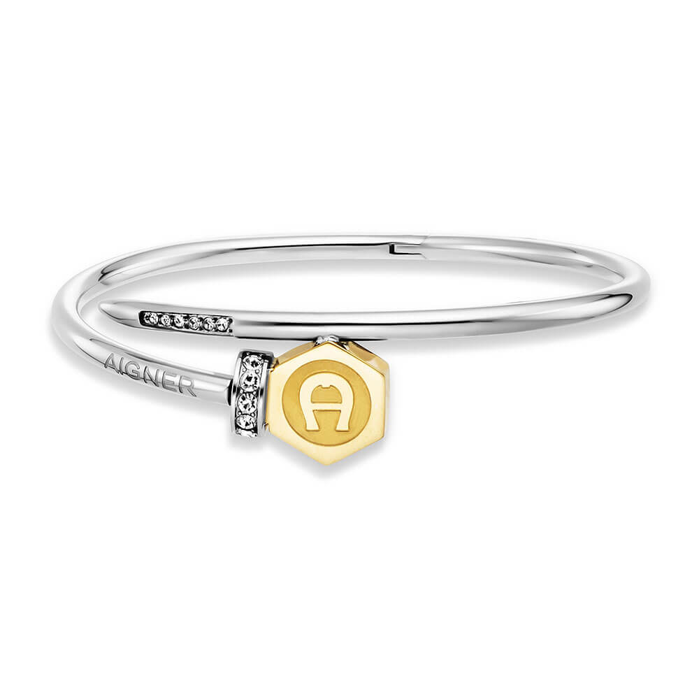 Silver-toned Aigner small stainless steel bangle with a gold-toned hexagonal logo charm and clear crystal embellishments.