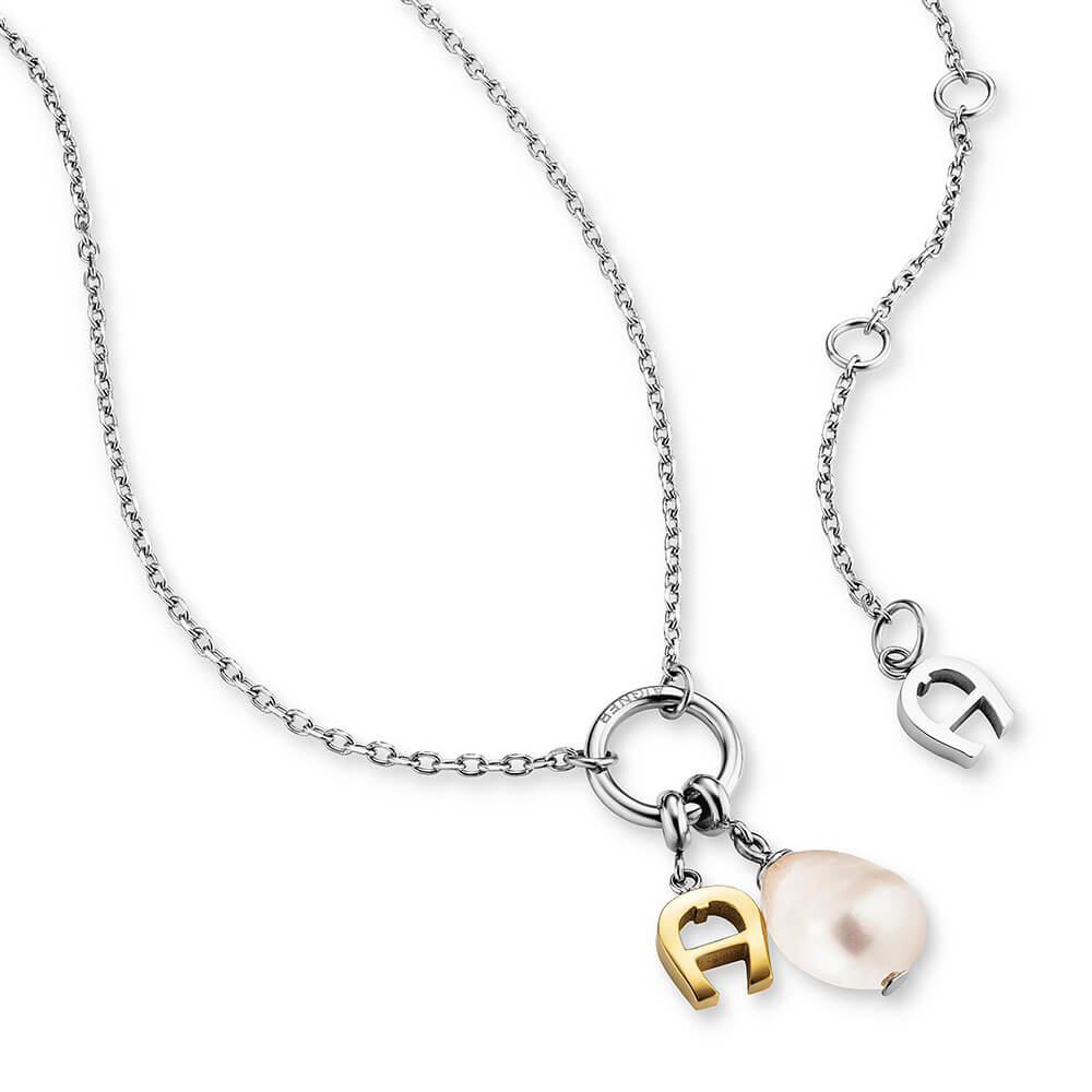 Silver-toned delicate chain necklace with a central ring, a gold-toned Aigner 'A' logo charm, and an off-white irregular pear