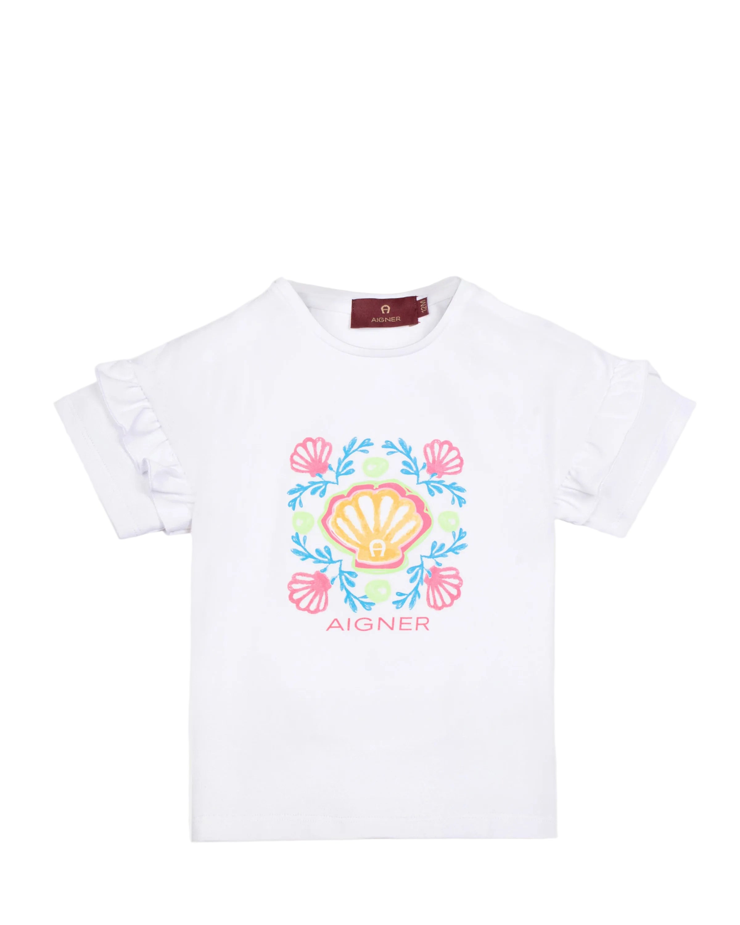 Front view flat-lay studio shot of the Aigner Kids girls white cotton T-shirt, highlighting its decorative double ruffle sleeves and the colorful pink, blue, and yellow seashell logo graphic.