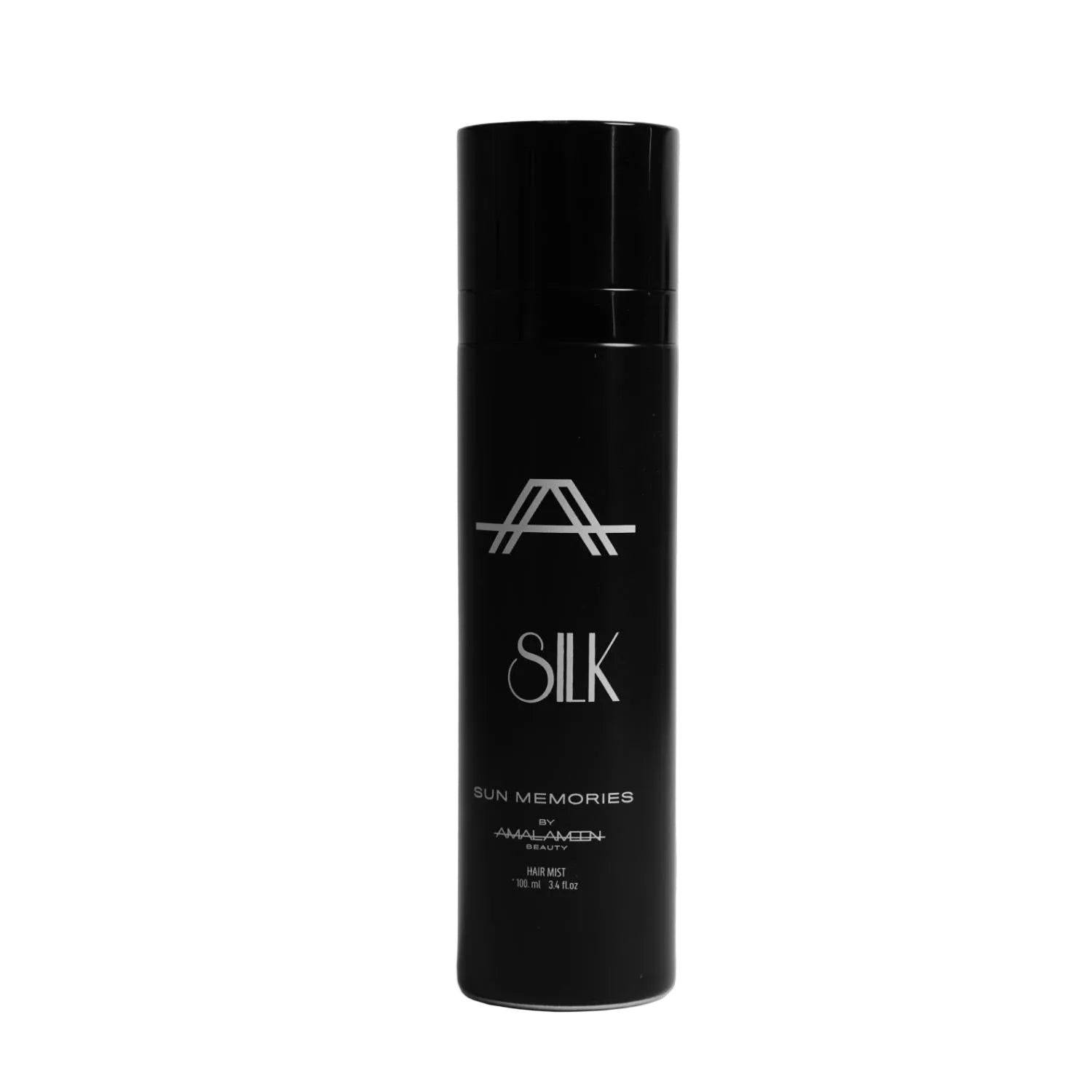 Studio product photograph of the Amal Ameen Beauty Silk Sun Memories Hair Mist 100ml bottle, featuring a sleek black cylindrical canister with a glossy cap and silver branding, shot against a clean grey background.