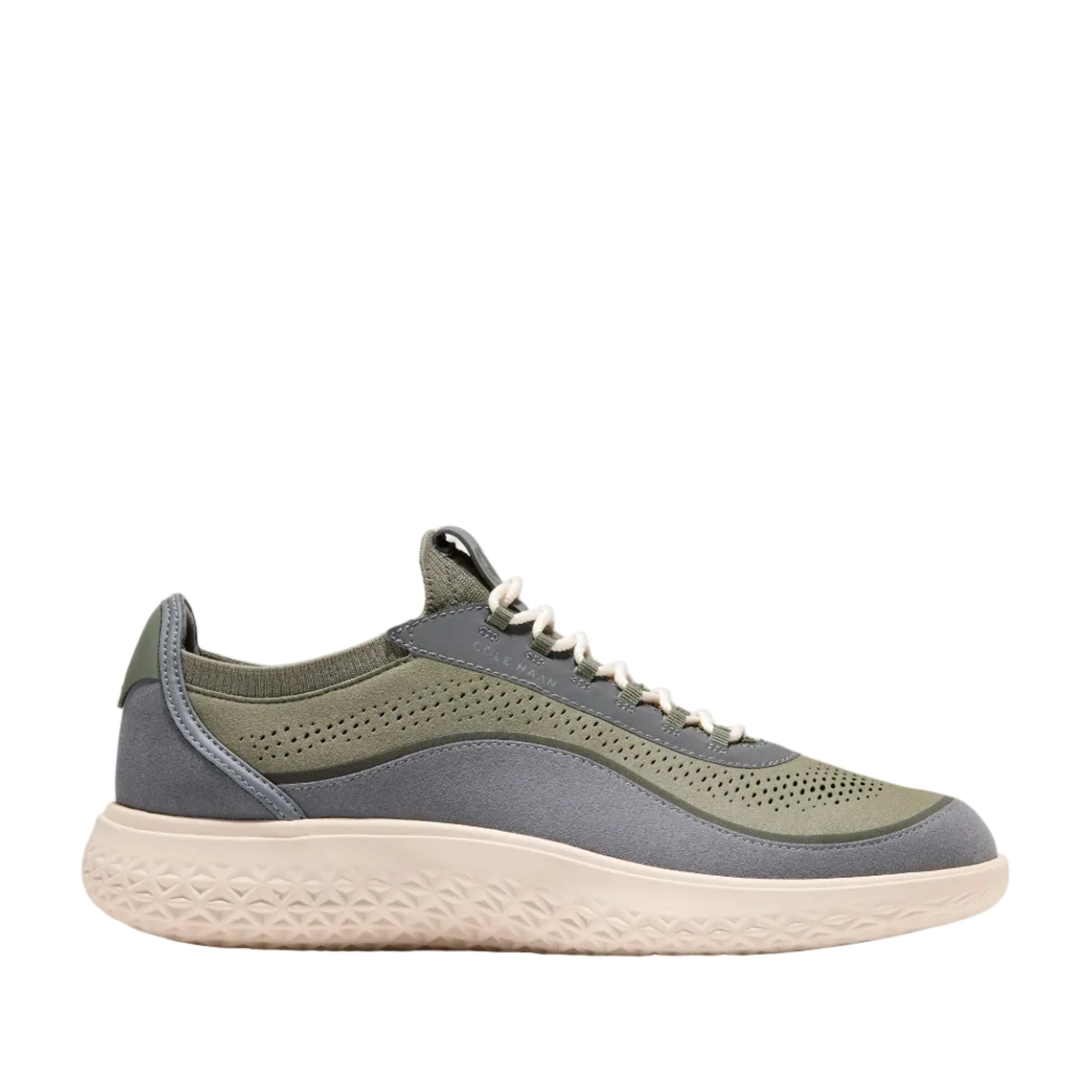 Olive green and grey Cole Haan Generation ZERØGRAND III sneakers with an off-white textured sole and white laces.