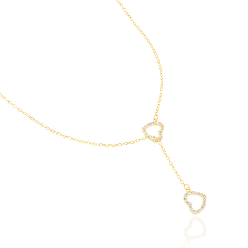 Gold-toned Y-drop necklace with two heart-shaped pendants, both outlined with clear pavé-set embellishments.
