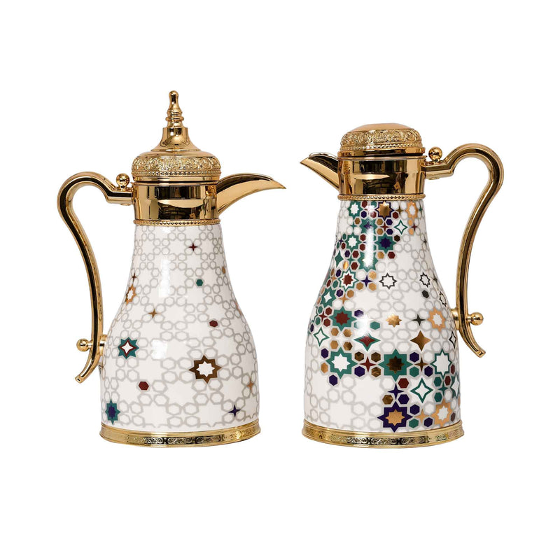 A pair of luxury CASA BLU thermoses for Arabic coffee and tea, featuring white bodies with colorful geometric star patterns and ornate gold-plated handles and lids.