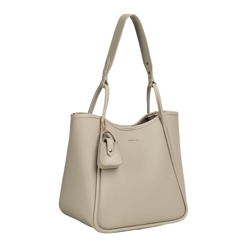 Studio product photograph of the Cerruti 1881 women's Ariel tote bag in ice grey grained leather, showcasing its adjustable shoulder strap and detachable micro-bag charm against a plain white background.