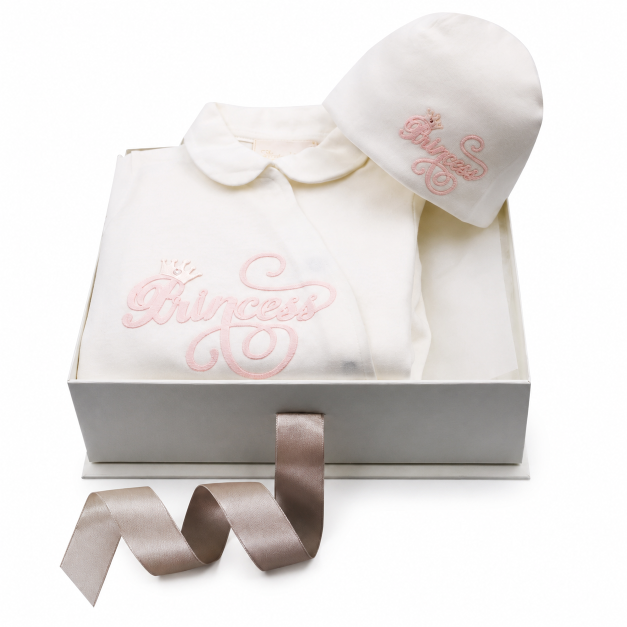 White knit baby sleepsuit with a rounded collar and pink 'Princess' embroidery, paired with a matching white knit hat.