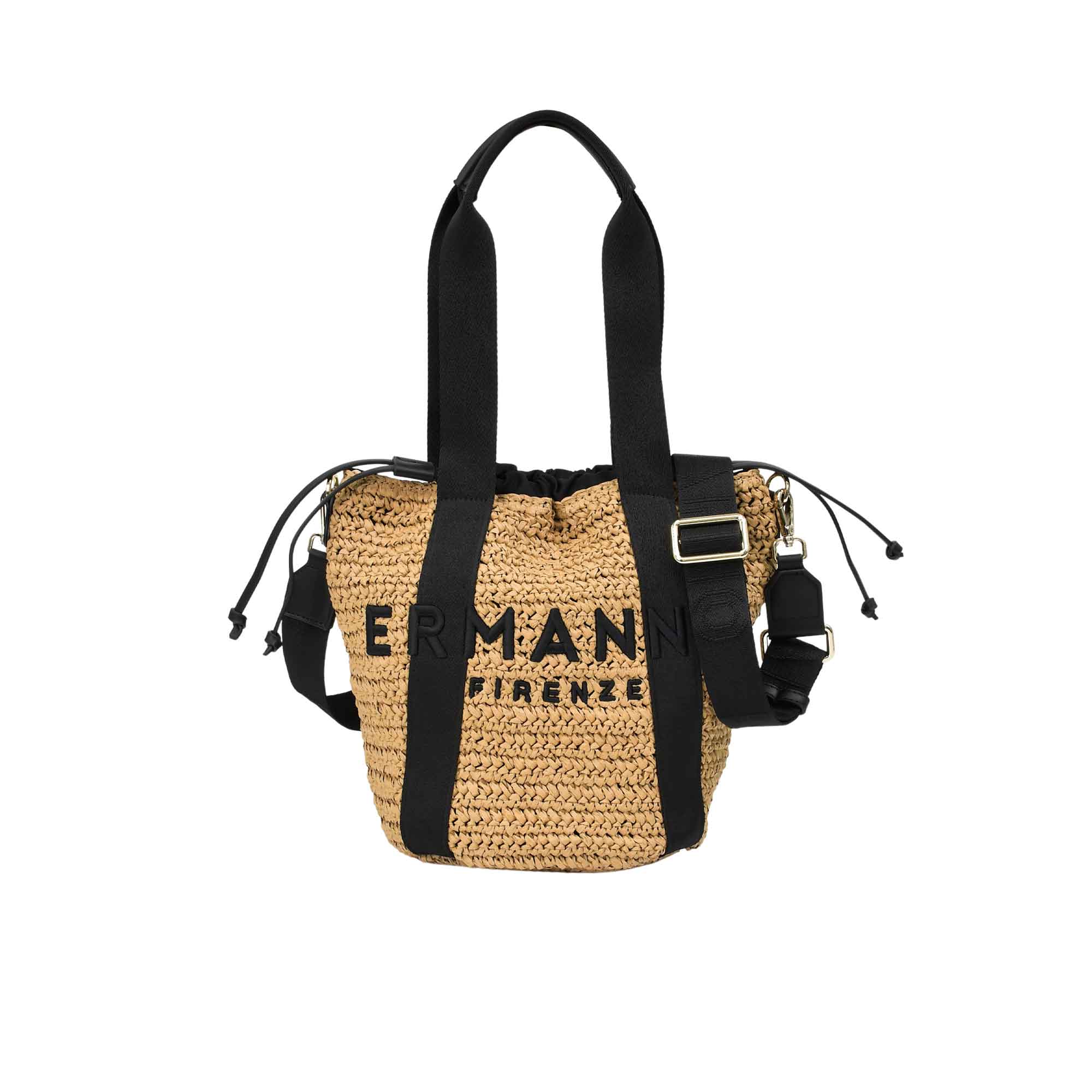 Direct front studio view of the Ermanno Firenze woven raffia tote bag from the BLUE SALON shop, showing the black embroidered logo, dual fabric handles, and adjustable shoulder strap.