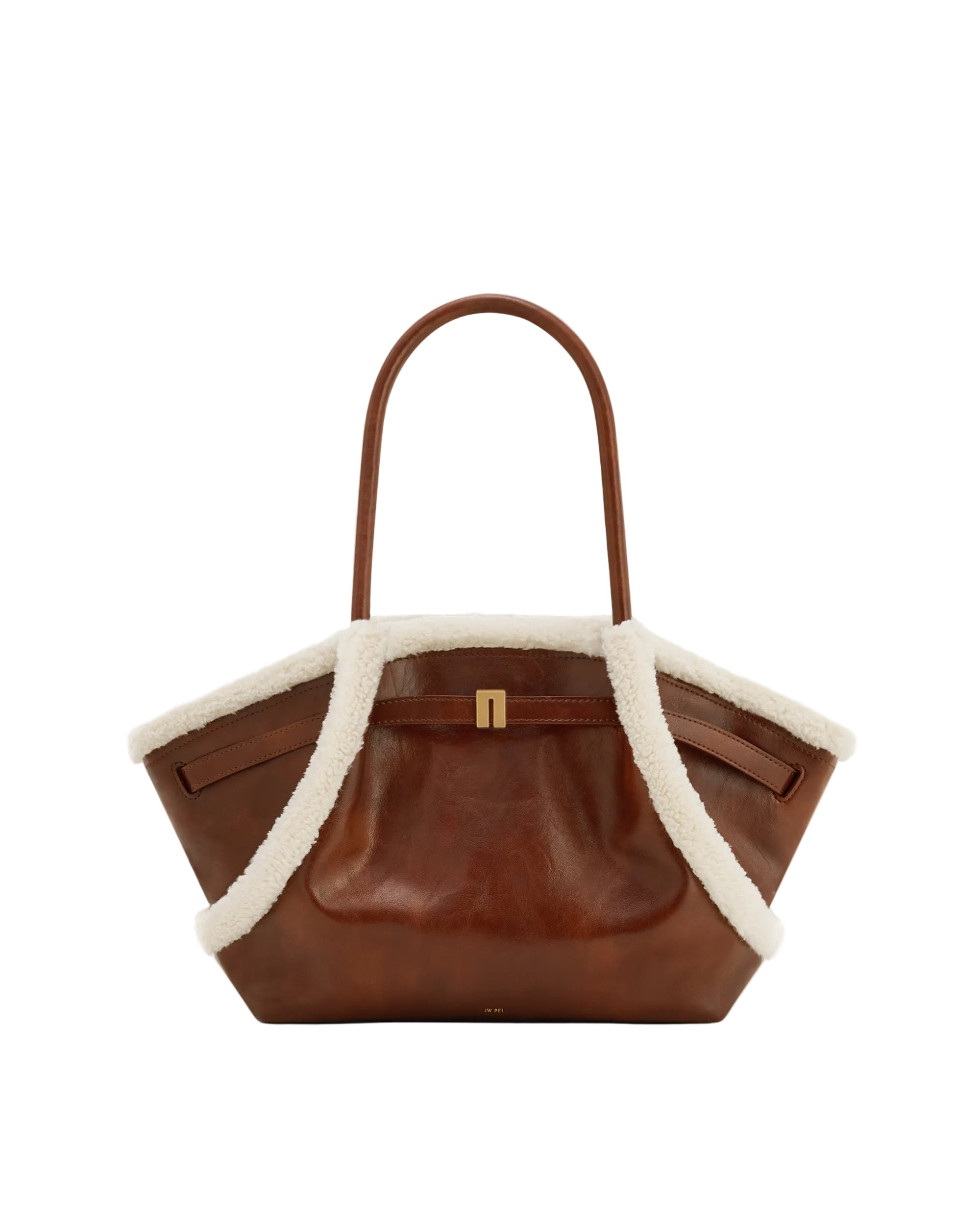 Brown leather tote bag with a single top handle, off-white plush trim, and a gold-toned rectangular clasp on the front.