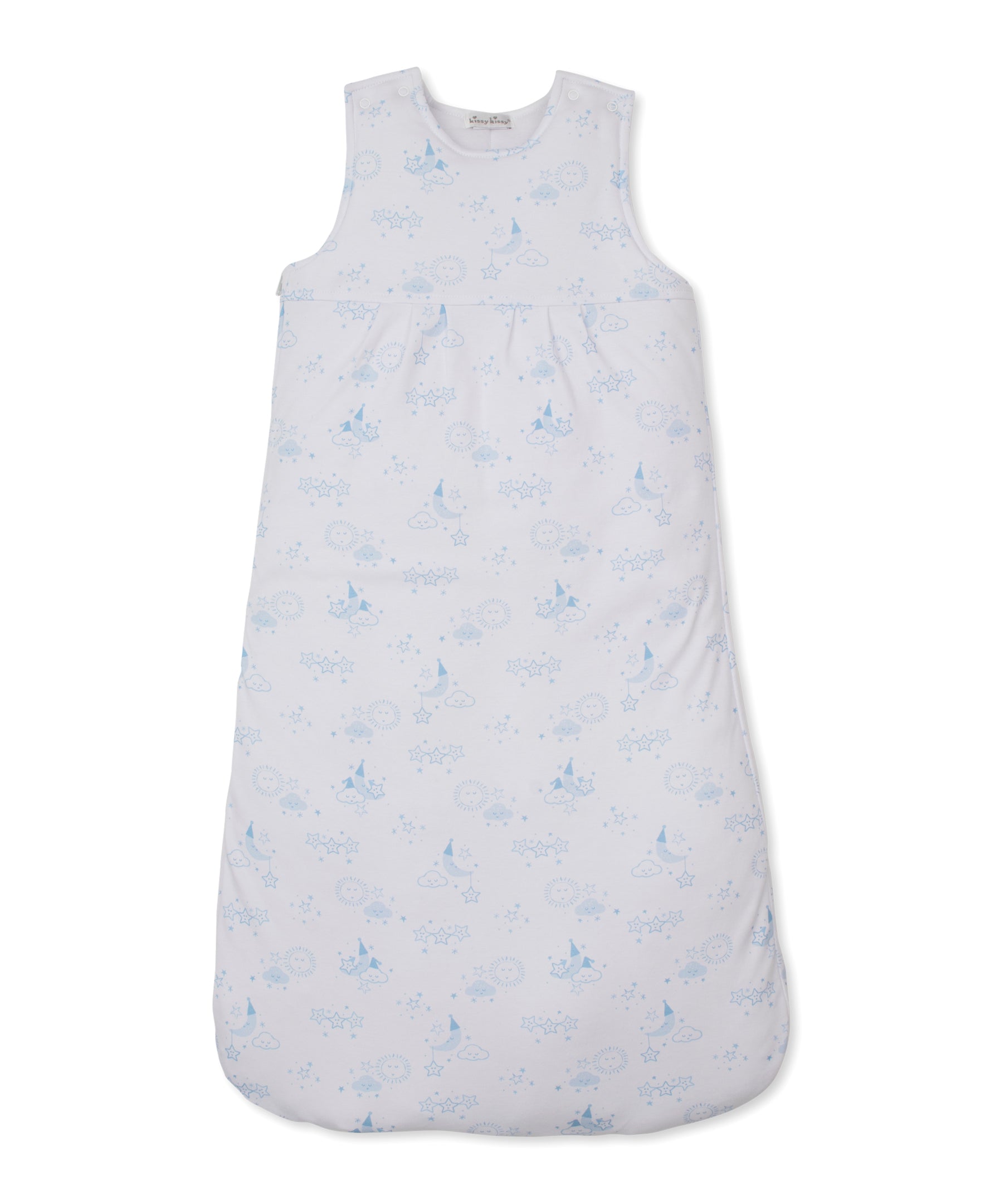 Light blue baby nest with white background and a pattern of moons, stars, clouds, suns, and castles.