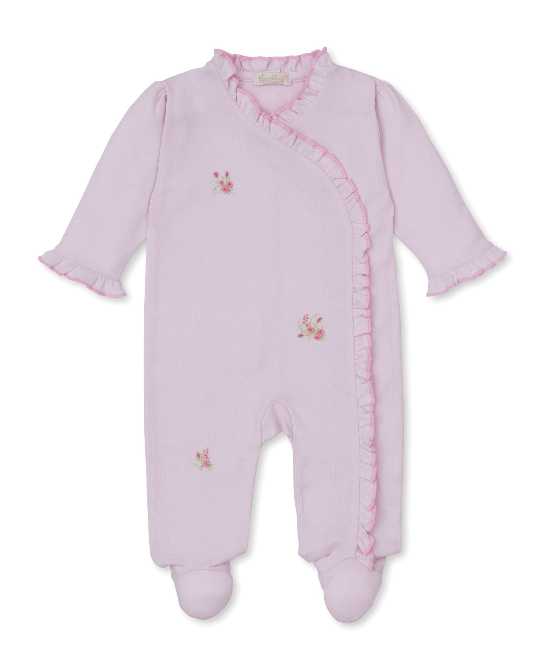 Pink baby sleepsuit with a wrap-over front, ruffled trim along the neckline and opening, floral embroidery, and integrated fo