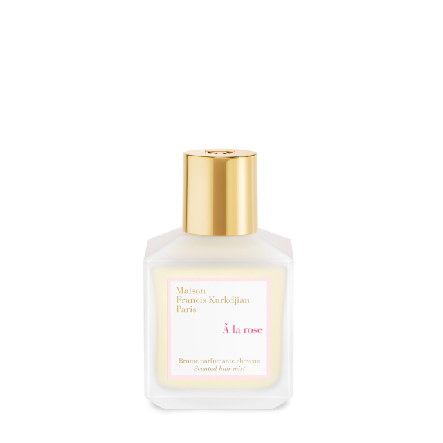 Maison Francis Kurkdjian A La Rose Scented Hair Mist in a frosted white glass bottle with a gold-toned cap.