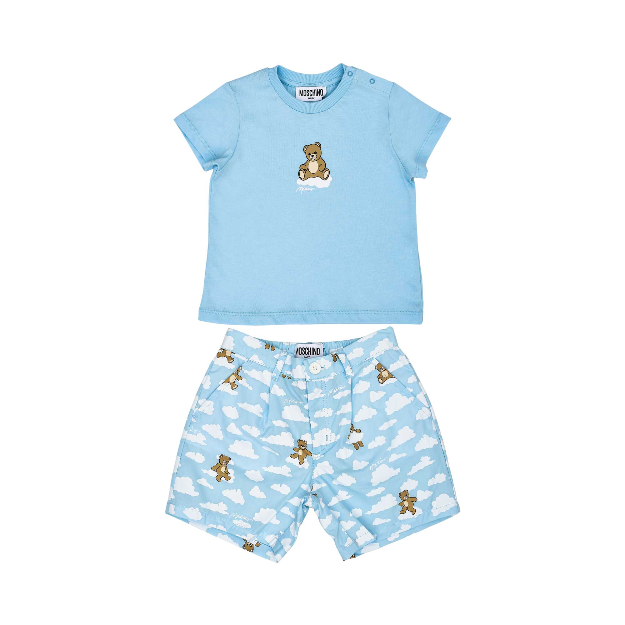 A baby boy's two-piece set featuring a light blue T-shirt with a teddy bear graphic and matching cloud-print shorts.