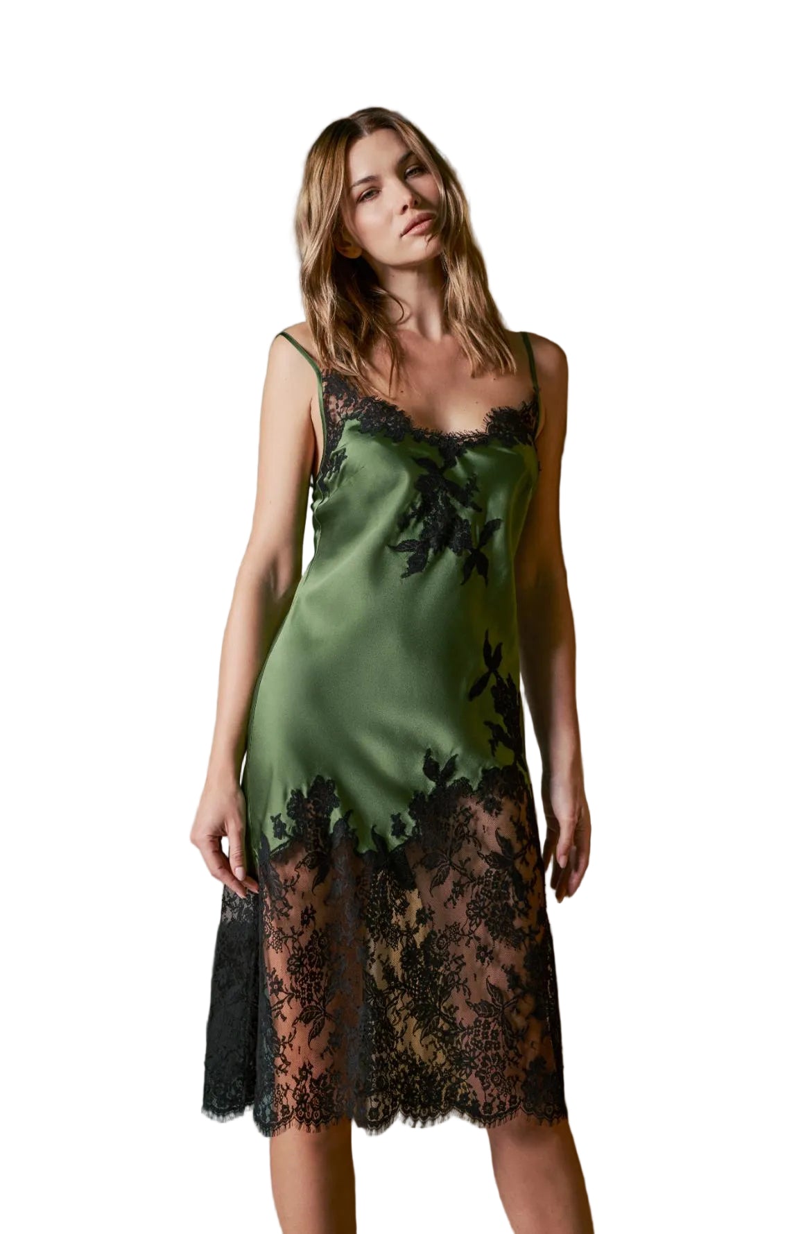 Model wearing Marjolaine olive green silk midi slip dress with black lace appliqué available at BLUE SALON.