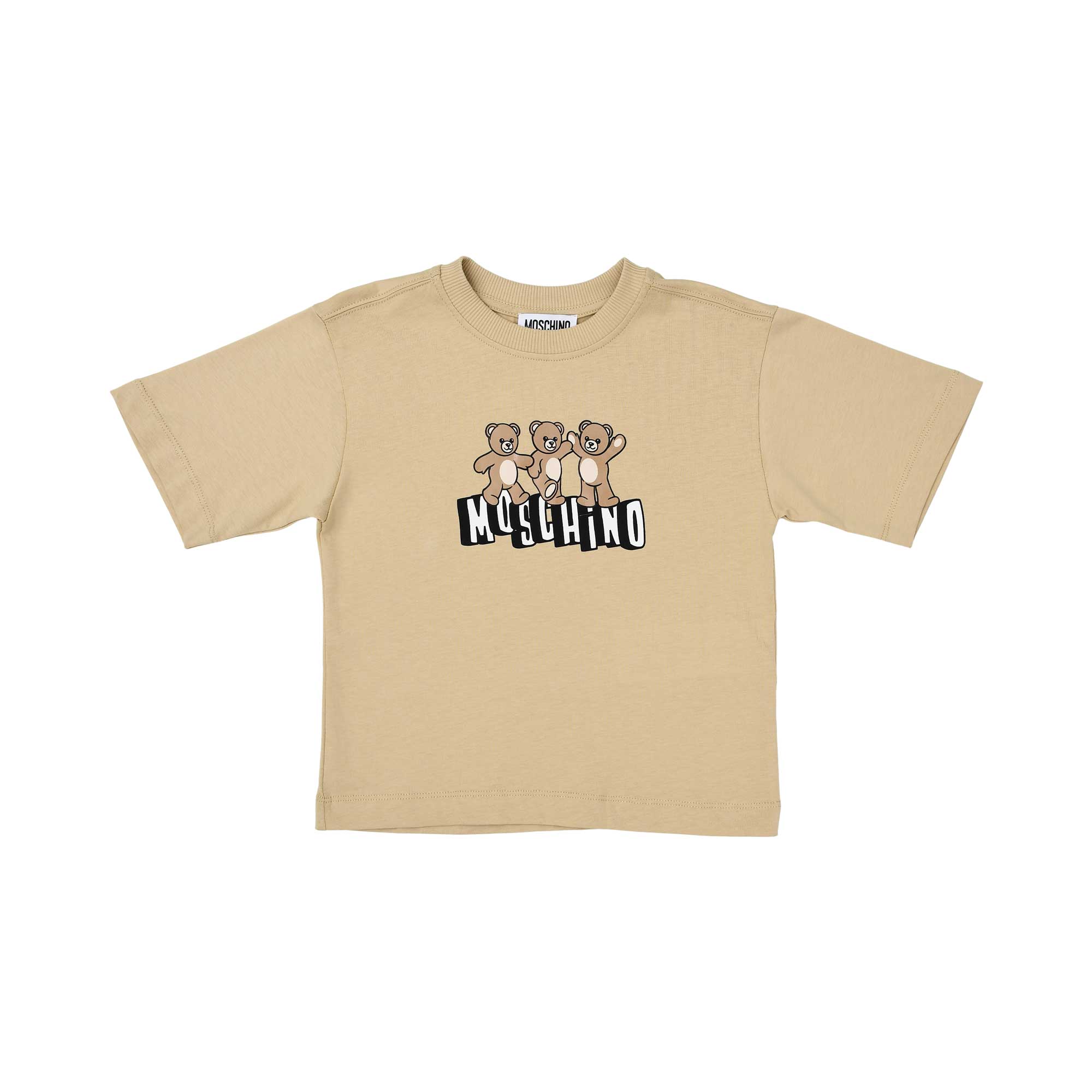 Front view of a beige Moschino Kids T-shirt featuring three Teddy Bears and a bold black and white logo.