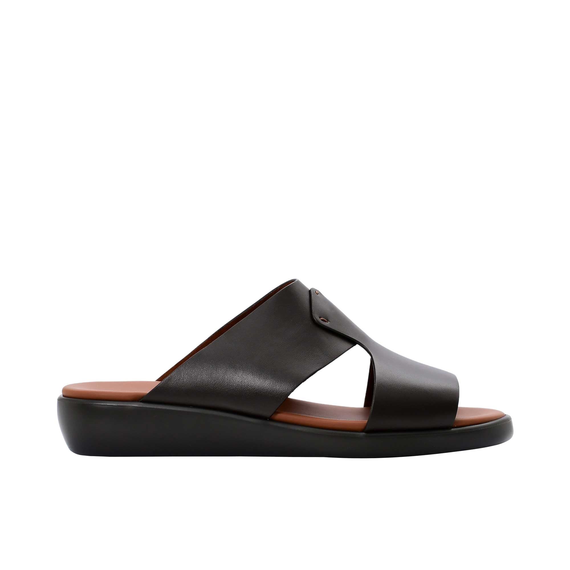 Side profile of a Prestige brown leather men's slide sandal showing the thick brown sole and tan footbed.