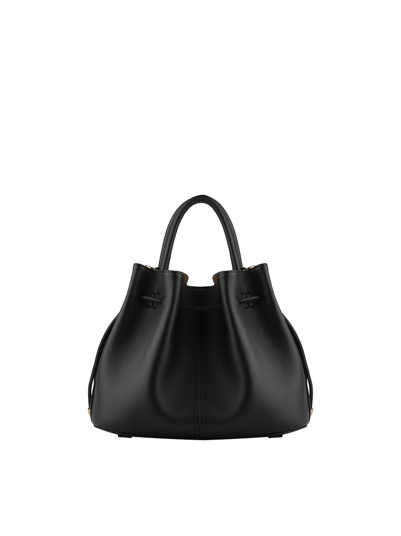 Back view of the Pourchet bucket bag in black leather, displaying the elegant curved silhouette and top handle design.