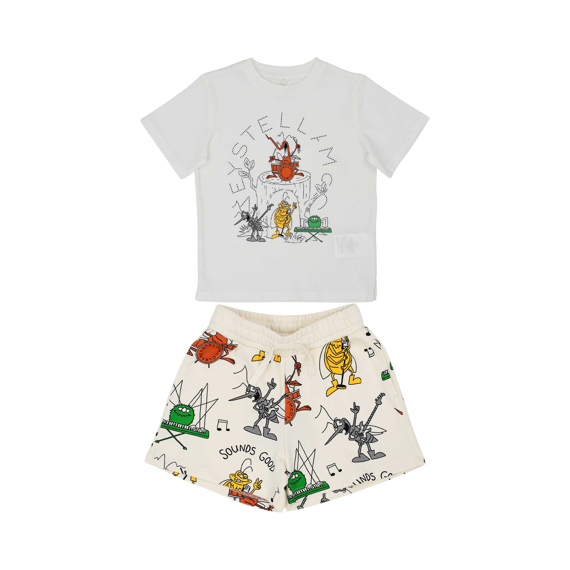 Front view of a Stella McCartney Kids set featuring a white t-shirt with a monster band graphic and cream shorts with an all-over monster print..