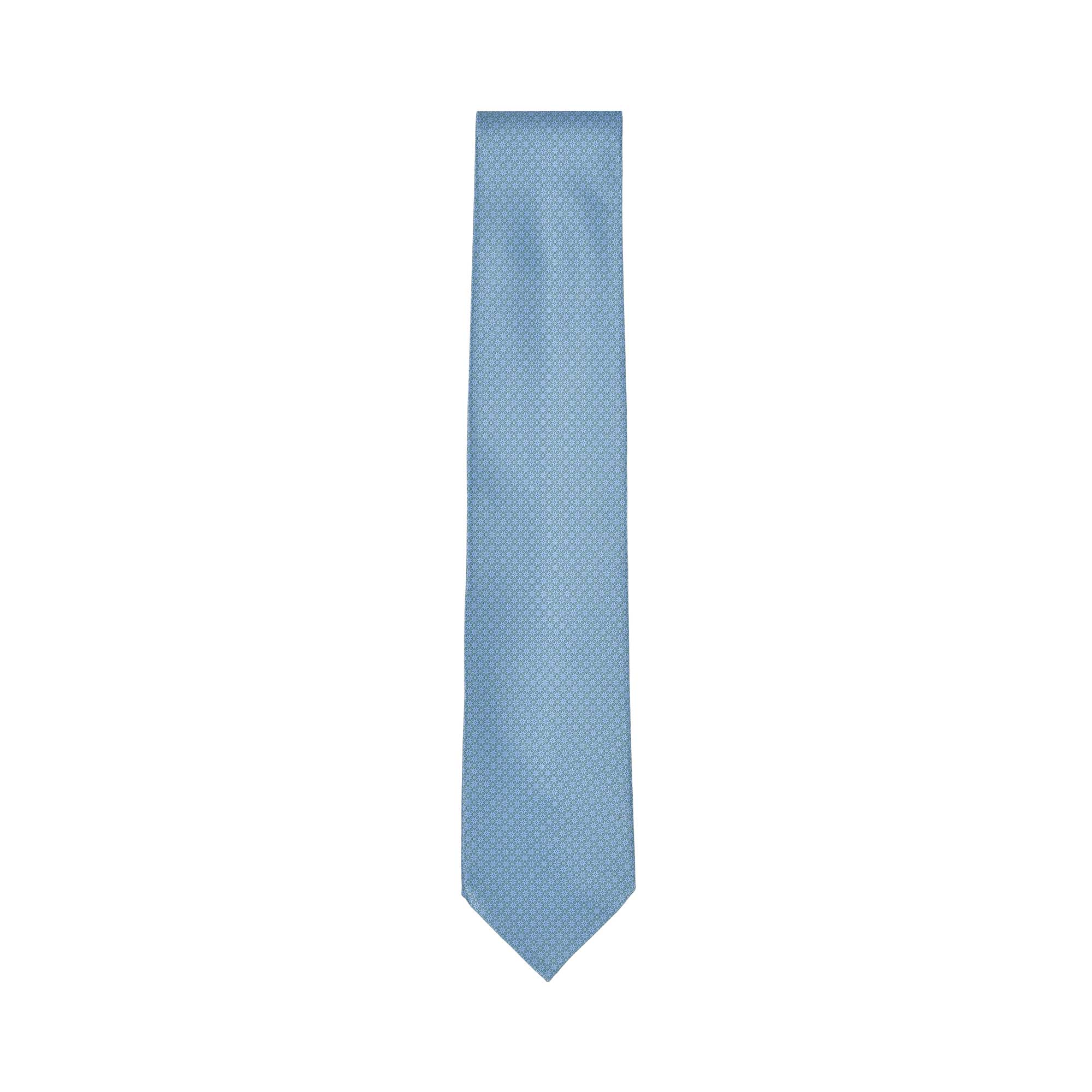 Light blue Stefano Ricci silk tie with a subtle geometric pattern and pointed tip.