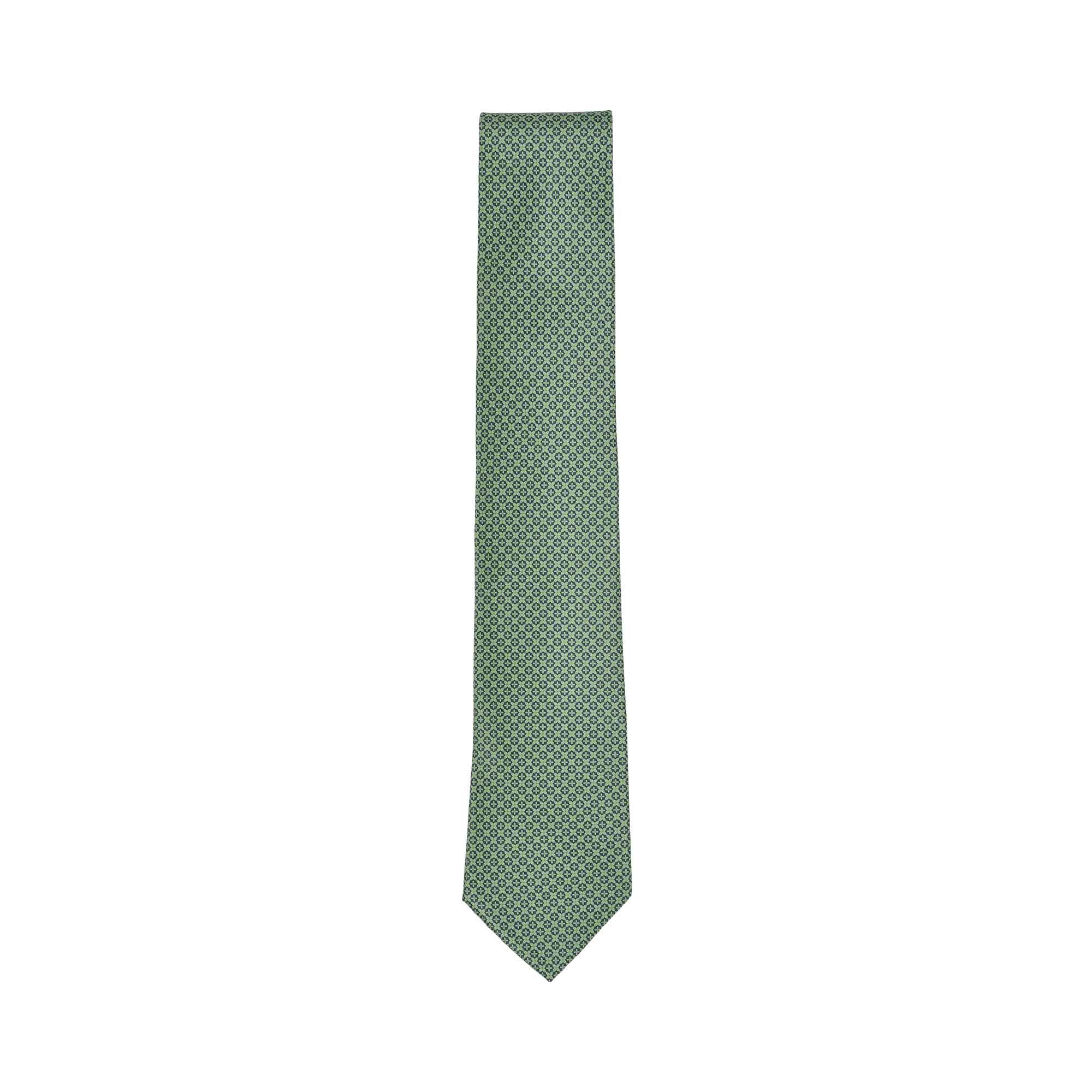 Light green necktie with a repeating dark green and light blue geometric pattern, featuring a pointed tip.
