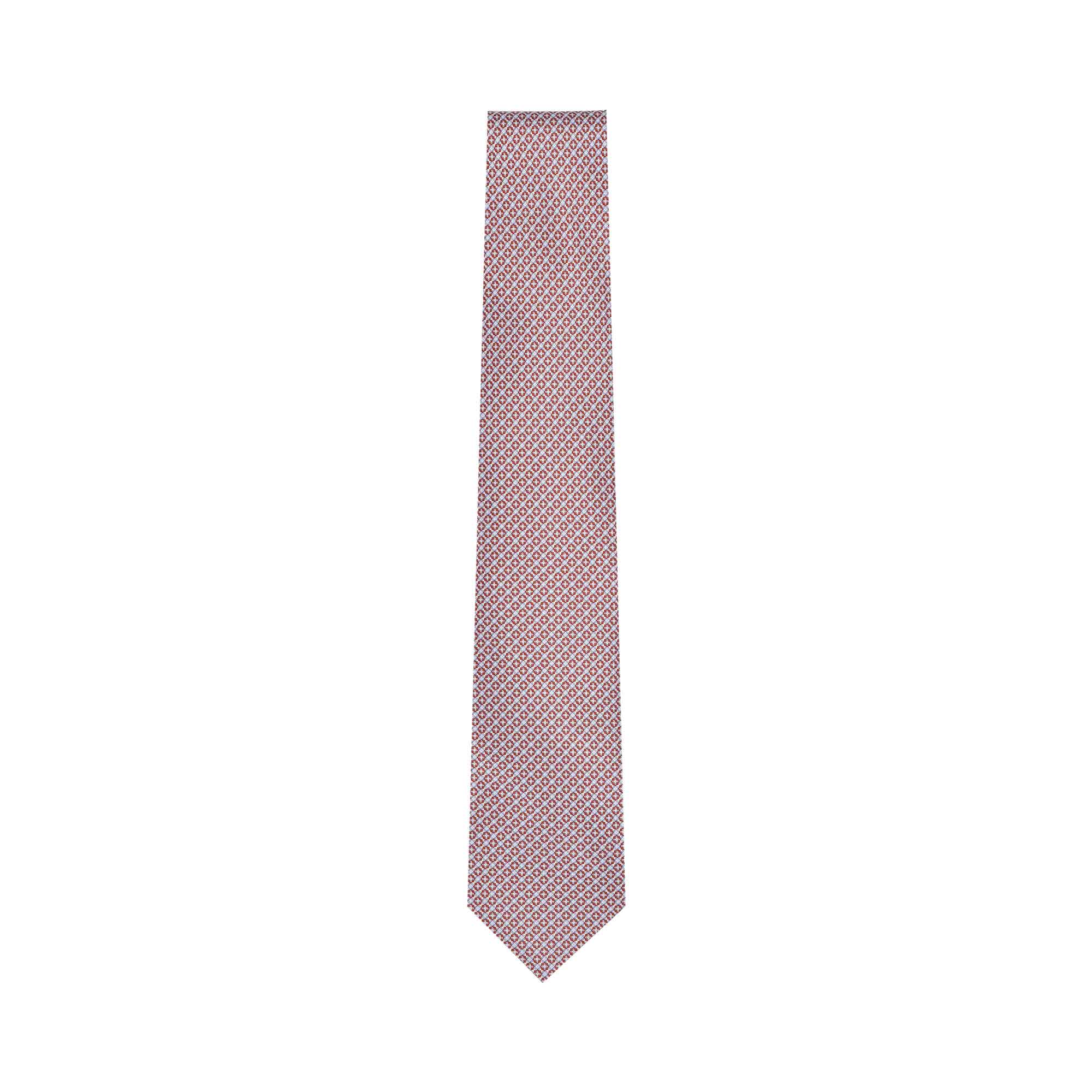 Reddish-brown geometric pattern silk necktie with a pointed tip.
