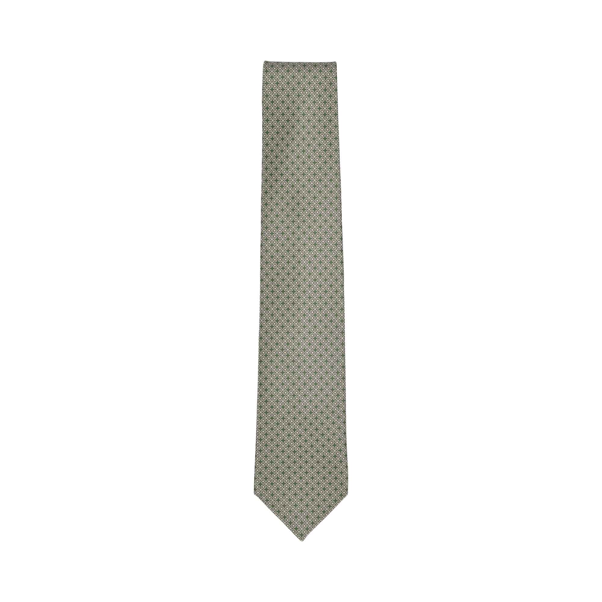 A single green necktie with a repeating light geometric pattern, laid flat against a white background.