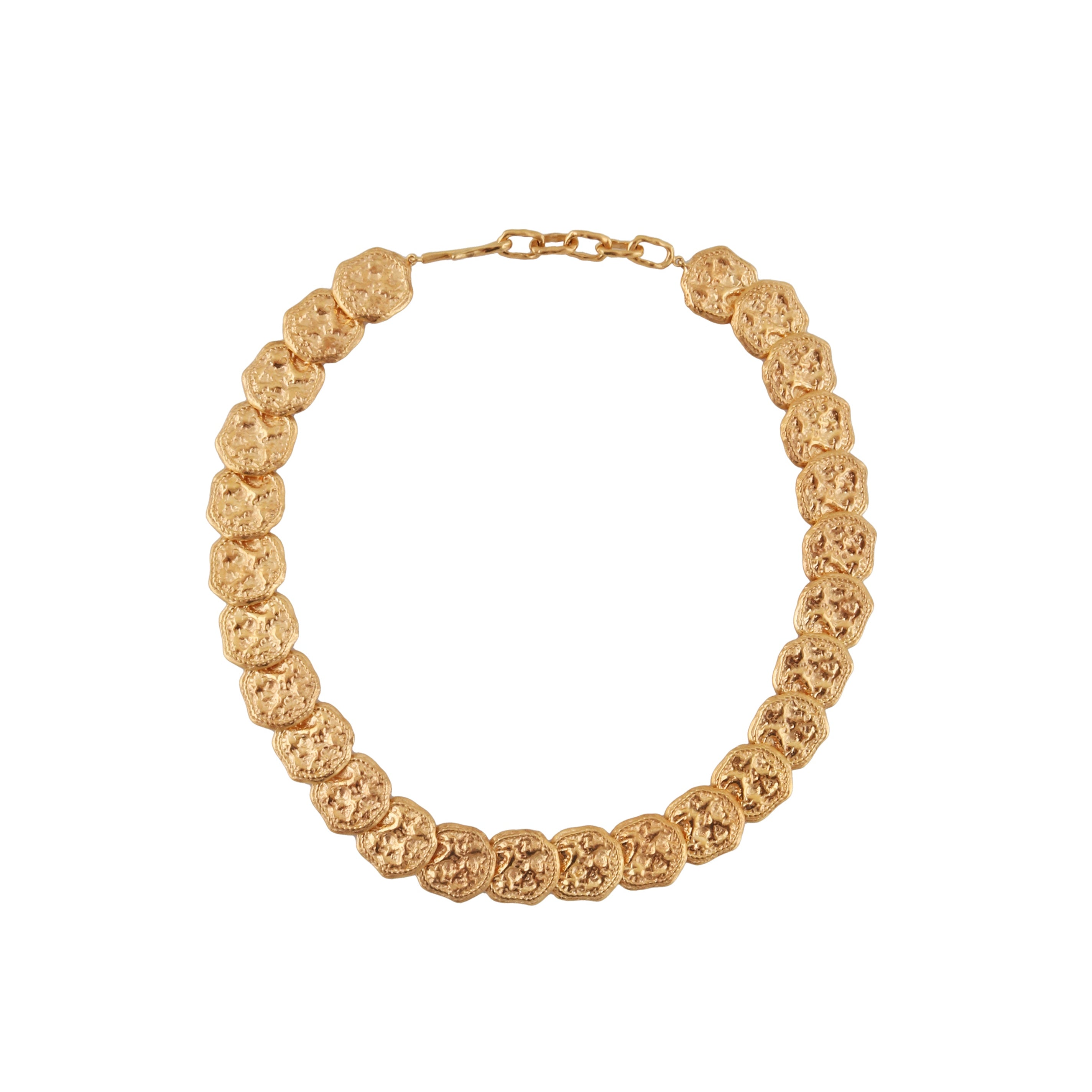 Gold-toned statement necklace featuring a series of textured, irregular coin-like elements linked together, with a chain exte
