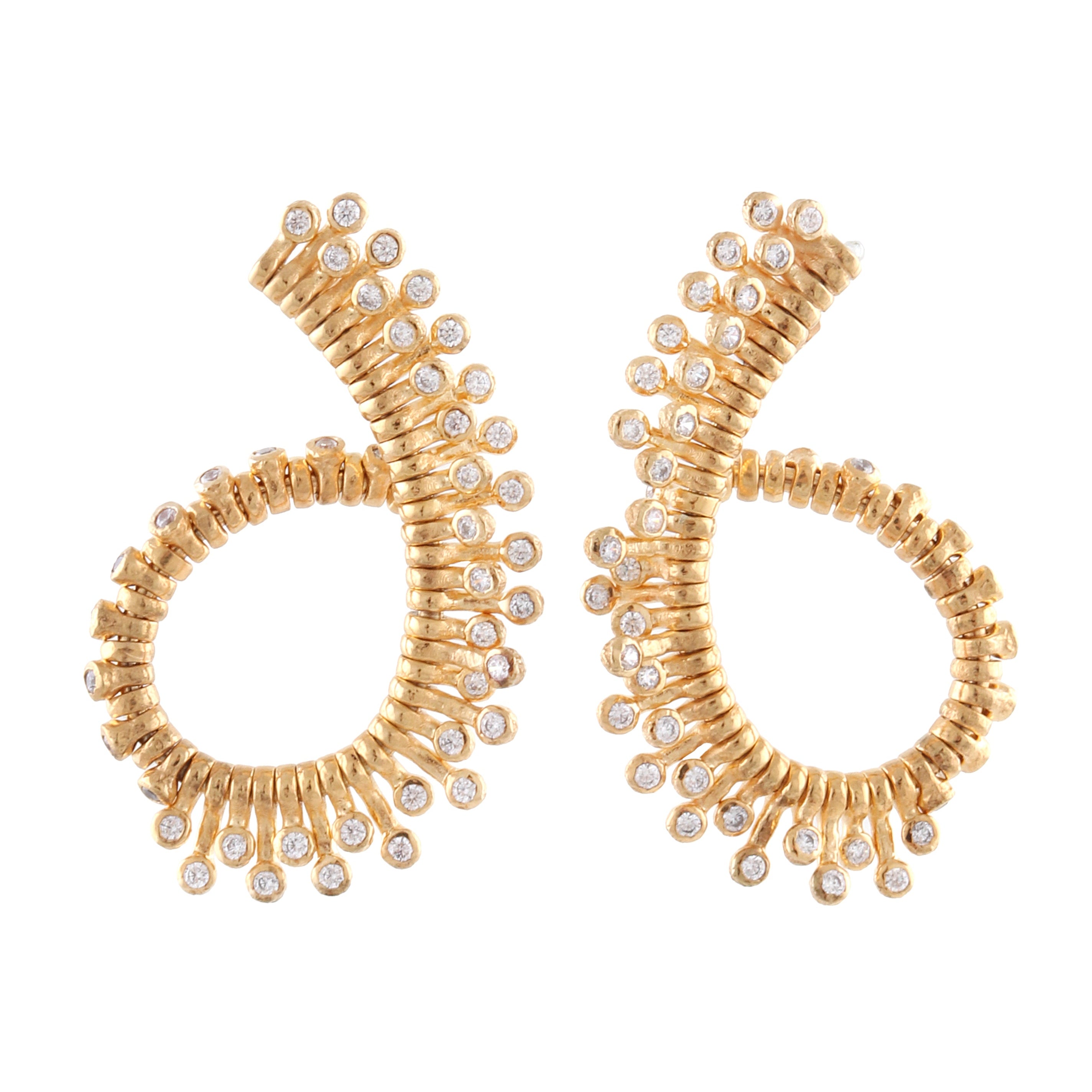 Pair of gold-toned twisted round earrings with numerous small, clear stones radiating outwards from the textured surface.
