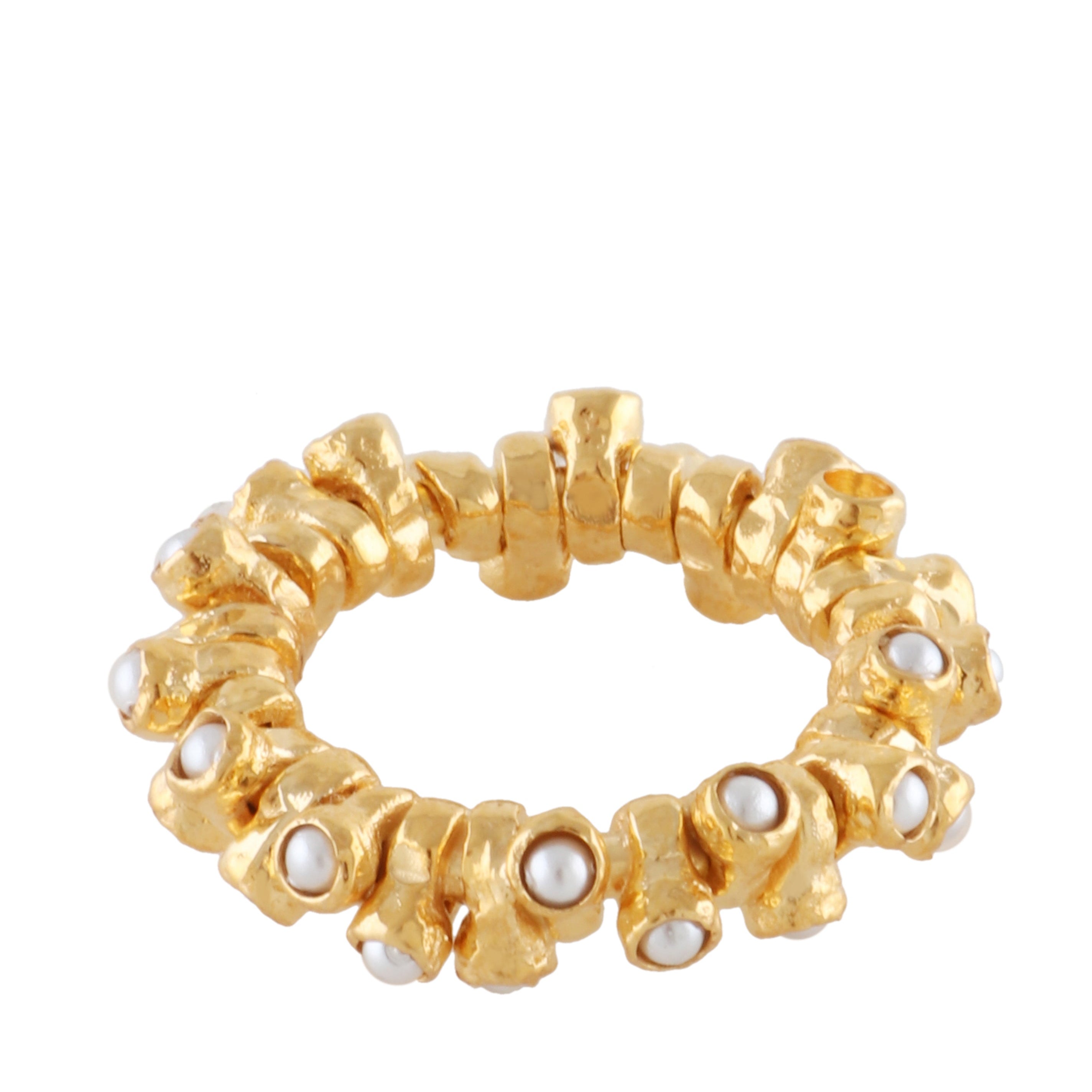 Gold-toned brass ring with a textured, segmented band, each segment featuring an irregular shape and set with small white pea