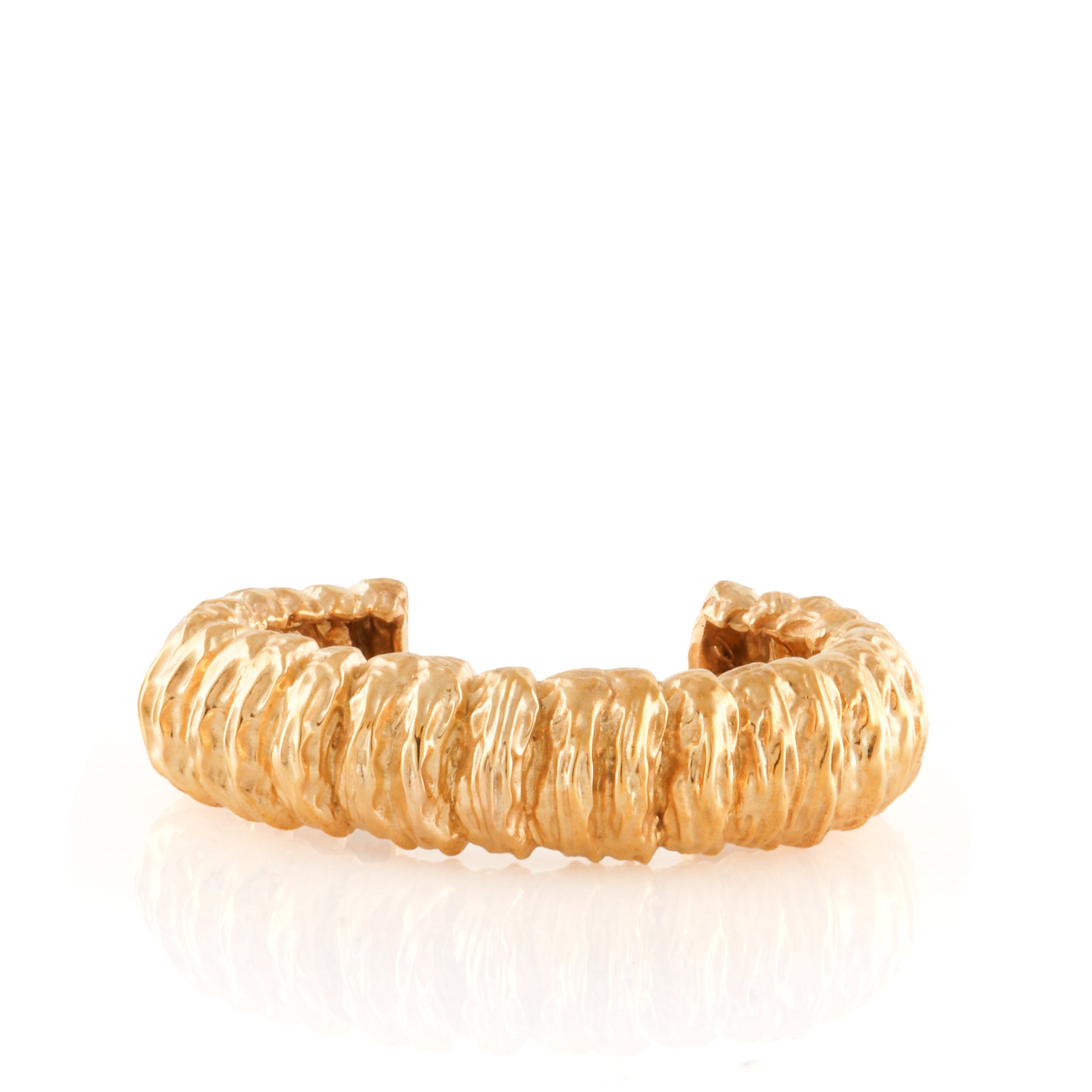 Gold-toned multi-wave corrugated cuff bracelet with an open back.