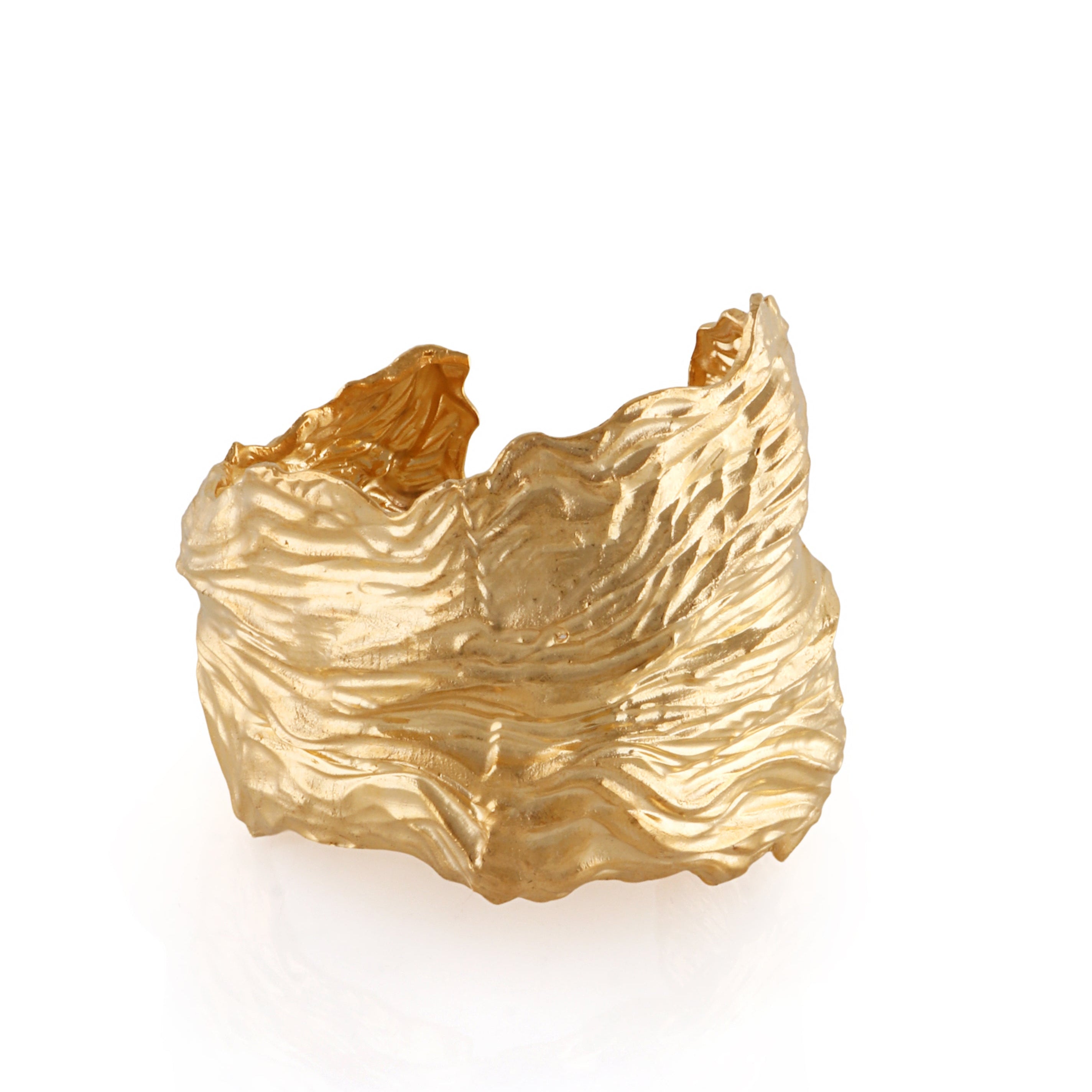Wide, open-ended gold-toned cuff bracelet with an organic, heavily textured, crumpled petal-like surface and irregular edges.