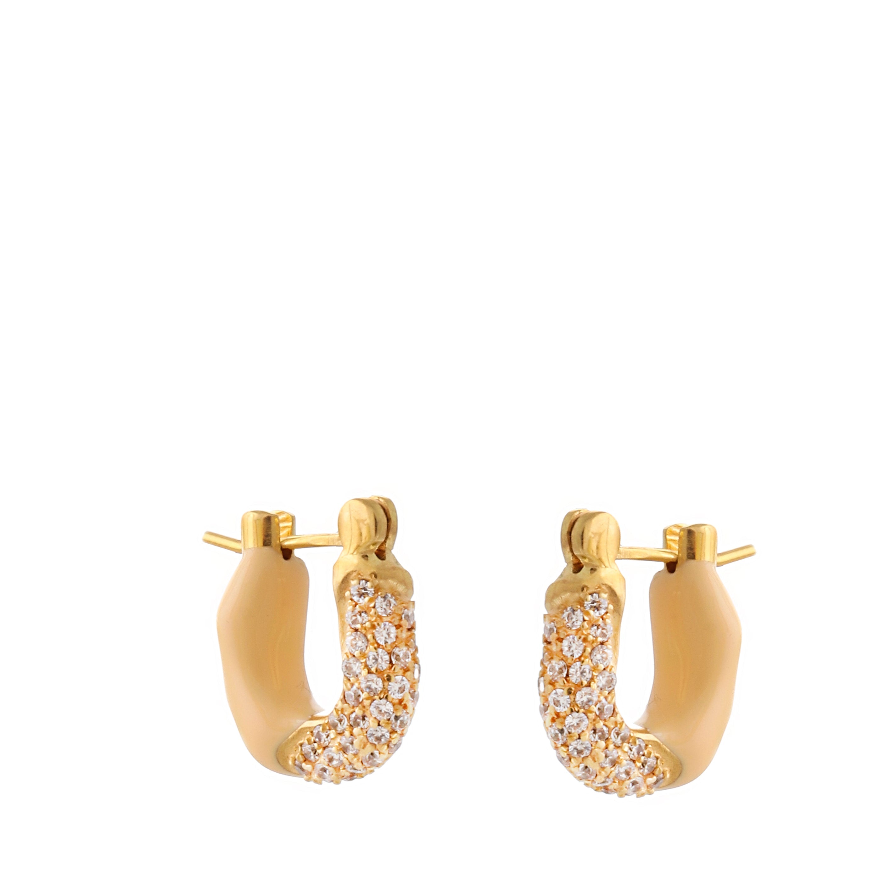 Pair of gold-toned wave hoop earrings with light beige enamel on one side and clear cubic zirconia stones on the other.