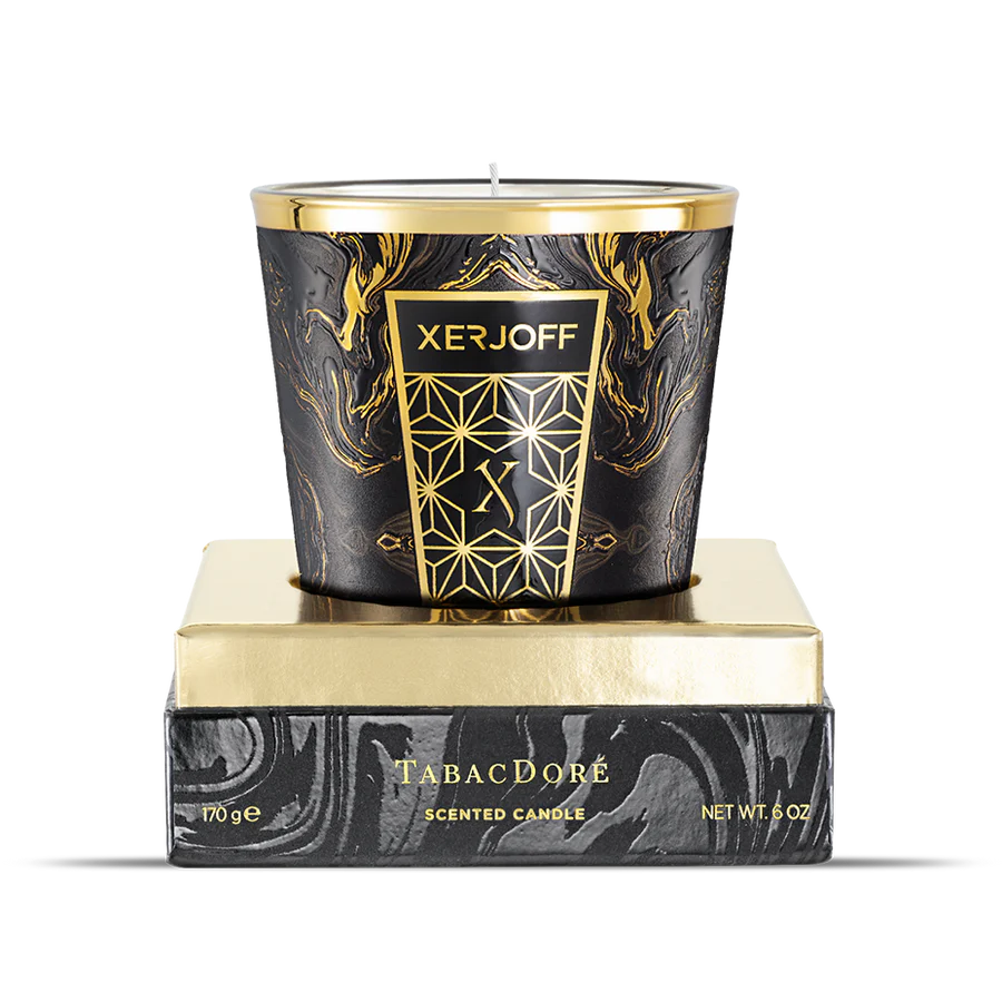 A luxury square presentation box for the Xerjoff TabacDoré candle, featuring a textured black and grey marbled pattern with the "XERJOFF" logo in gold.