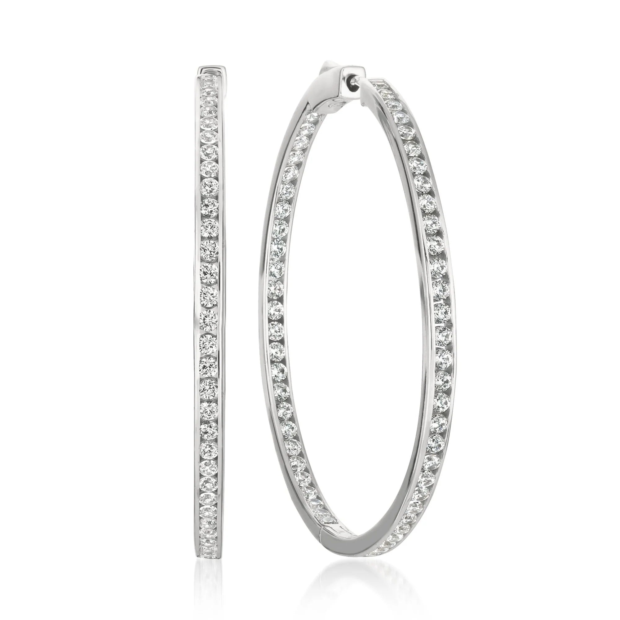 Pair of large silver-toned hoop earrings, each embellished with rows of clear, sparkling cubic zirconia stones on both inner