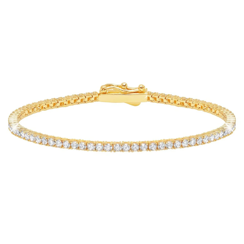 Gold-toned tennis bracelet featuring a continuous line of clear, round-cut cubic zirconia stones and a secure clasp.