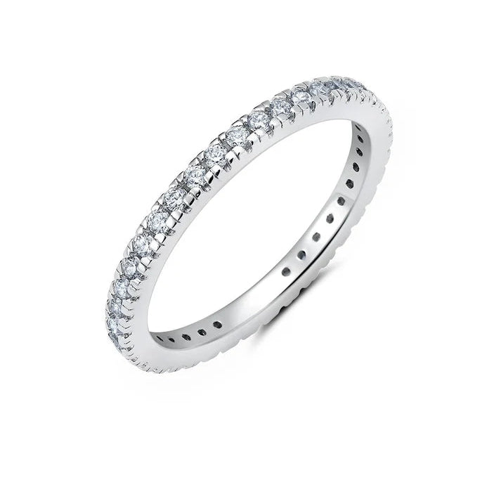 Silver-toned eternity band with clear, round-cut cubic zirconia stones in prong settings.