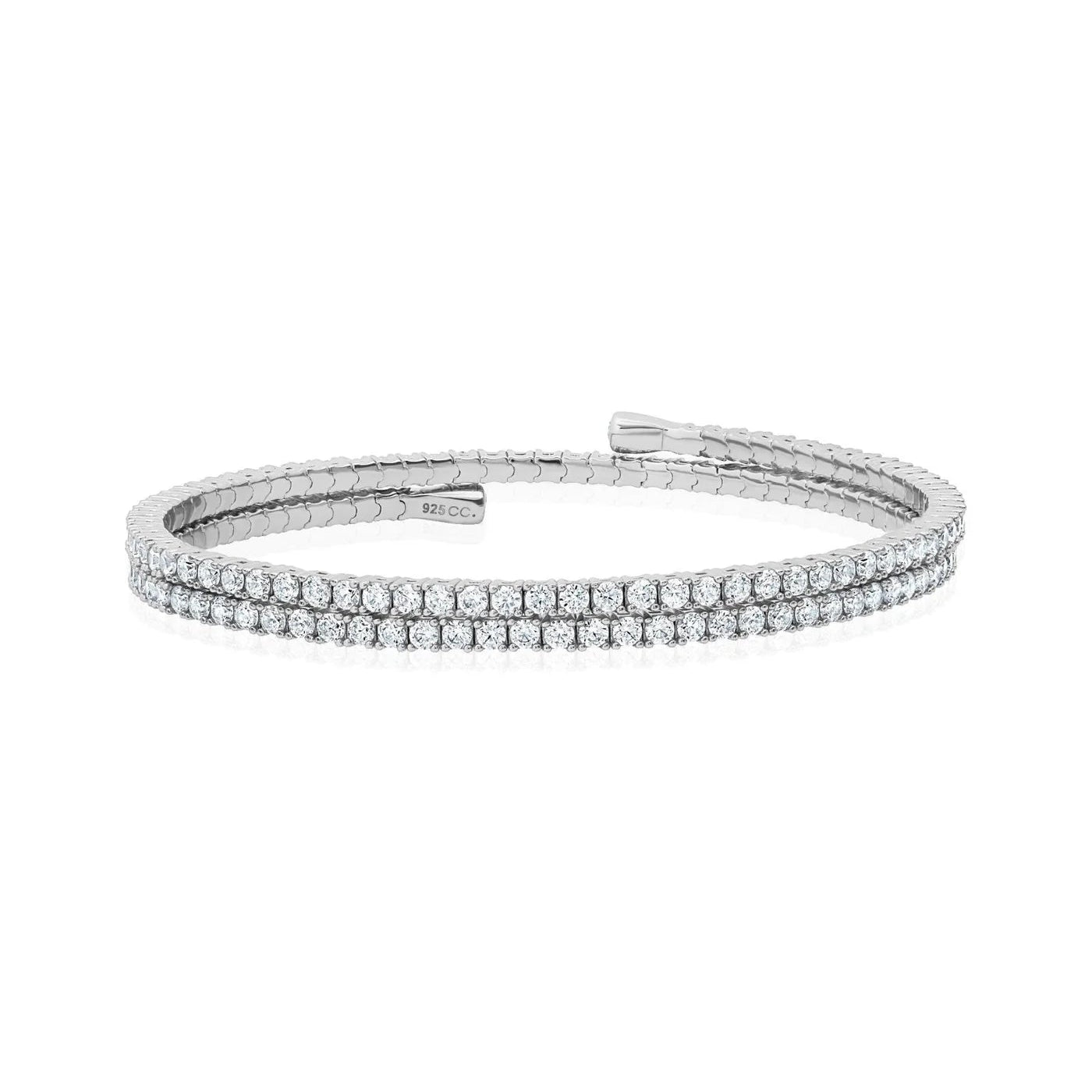 Silver-toned dual-band open cuff bracelet with one band set with clear round stones and the other with a textured pattern.
