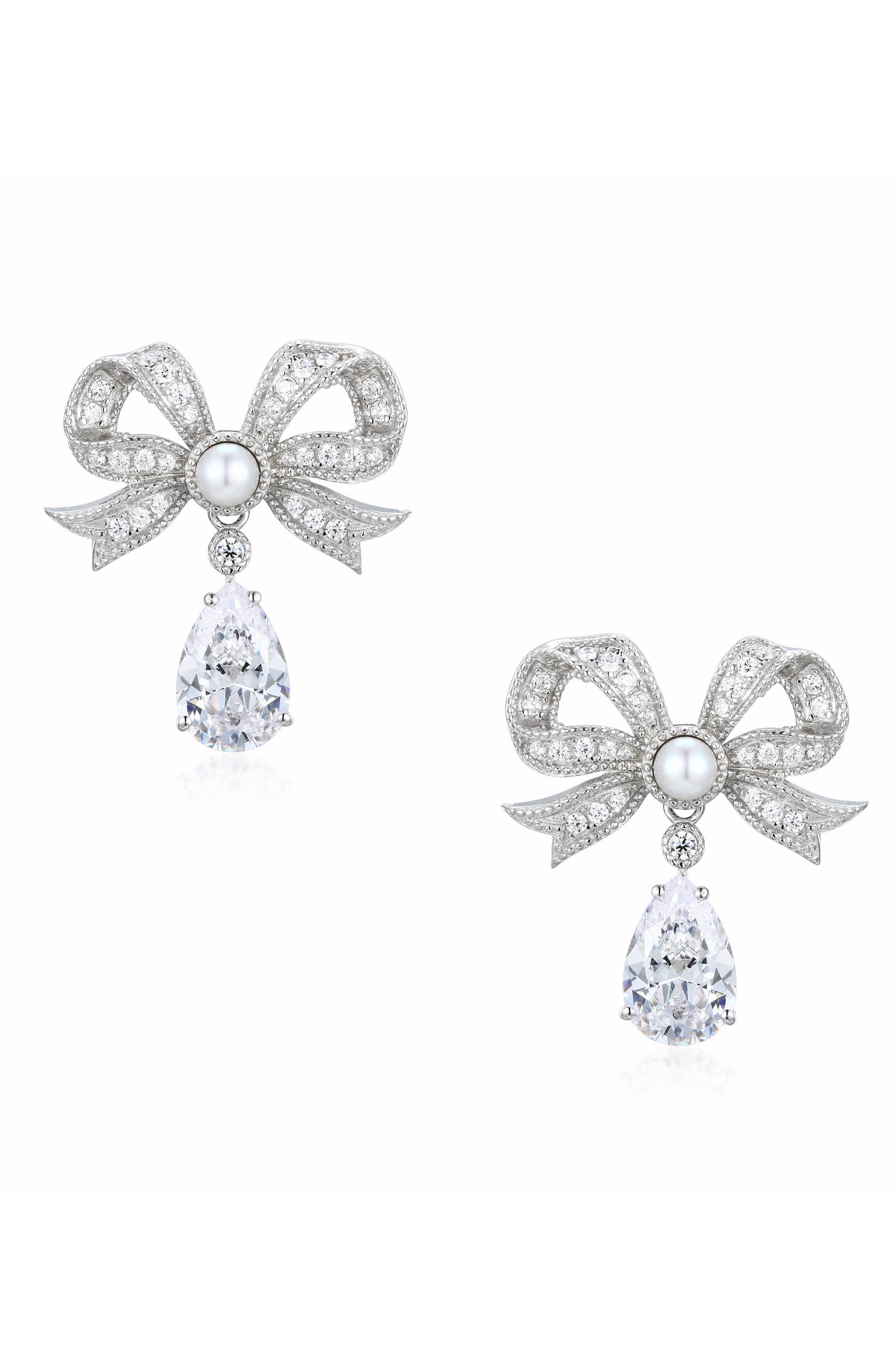 ront view of the Santinni Grand Duchess earrings featuring a pavé crystal bow and pear drop.
