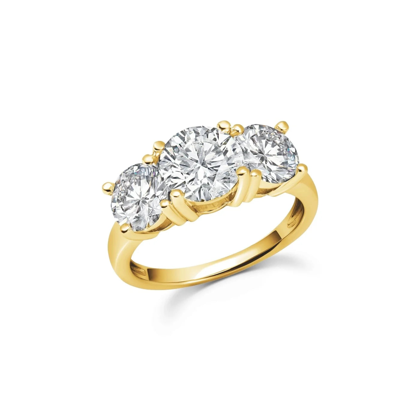 Gold-toned three-stone ring with three clear round cubic zirconia stones, the central one slightly larger.