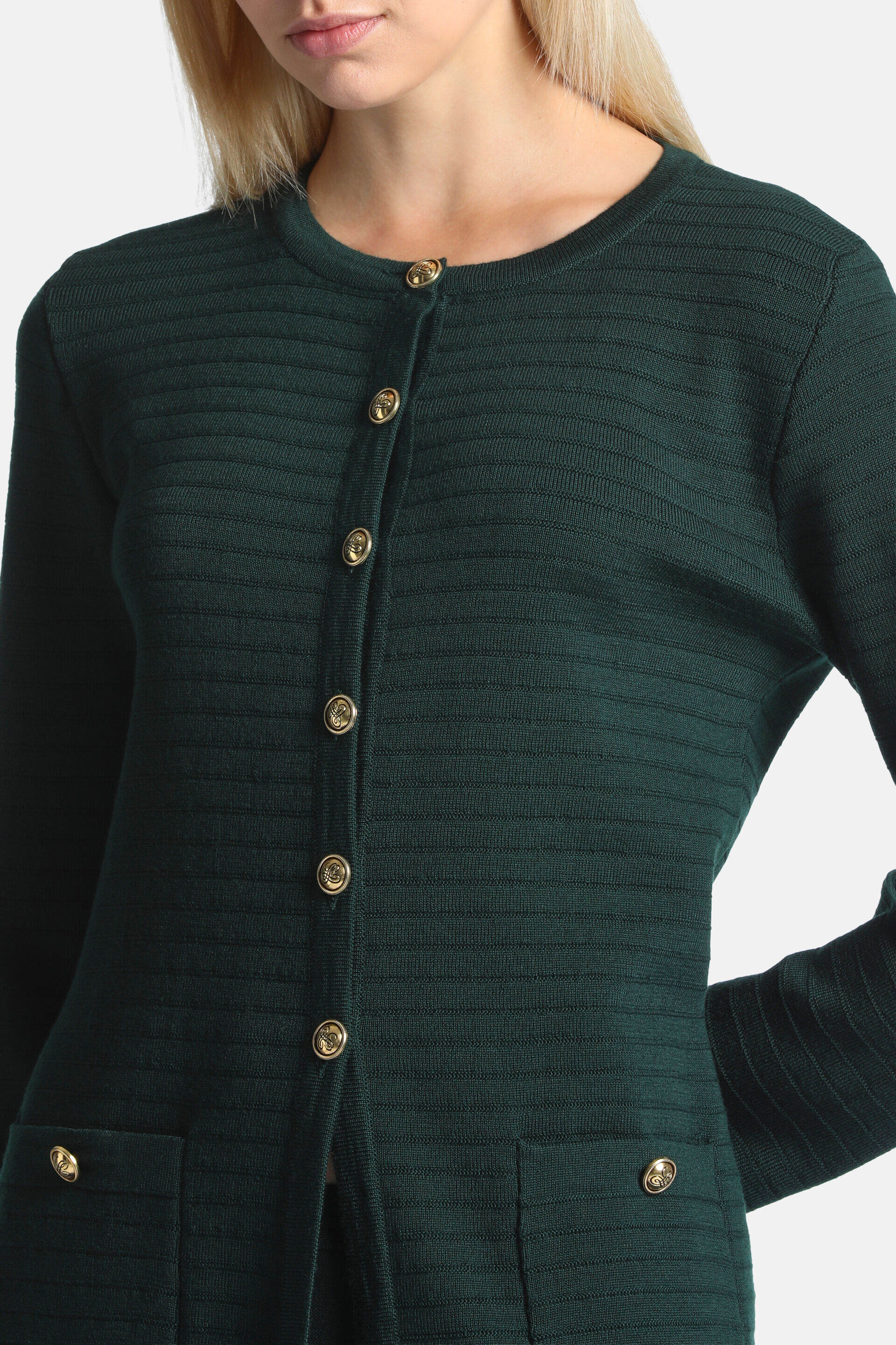 Green knitted cardigan with a ribbed texture, round neck, long sleeves, gold-toned front buttons, and two patch pockets with
