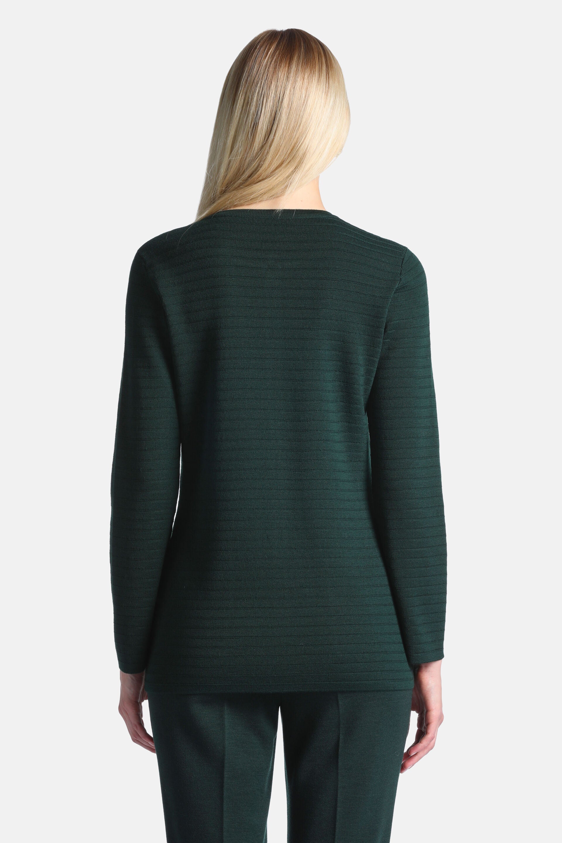 Dark green cardigan with long sleeves and a subtle horizontal ribbed knit texture on the back and sleeves.