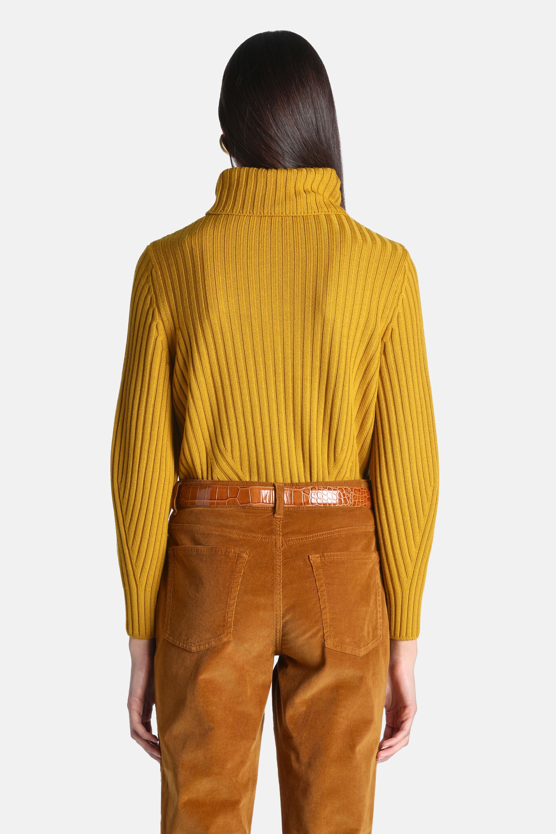 Mustard yellow ribbed knit turtleneck pullover with long sleeves, shown from the back.