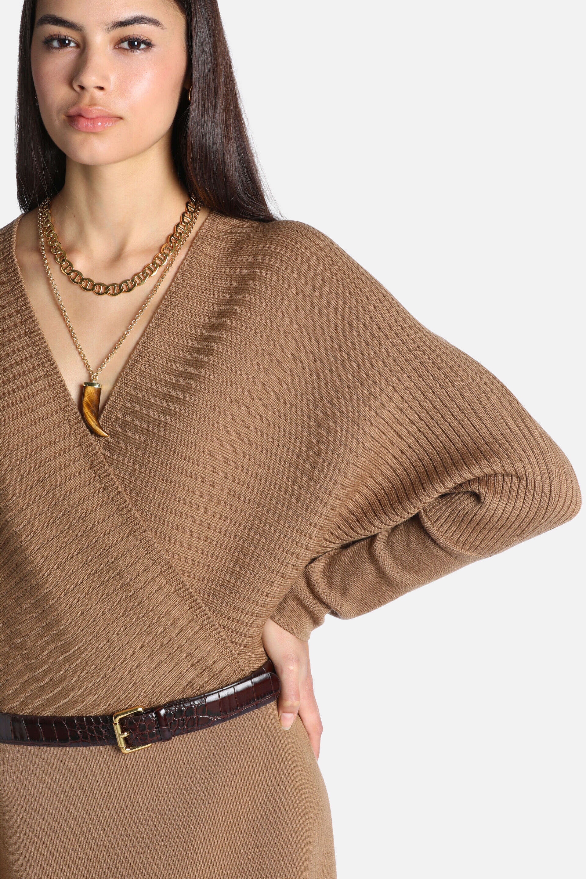 Brown ribbed knit wrap dress with a V-neck and long sleeves.