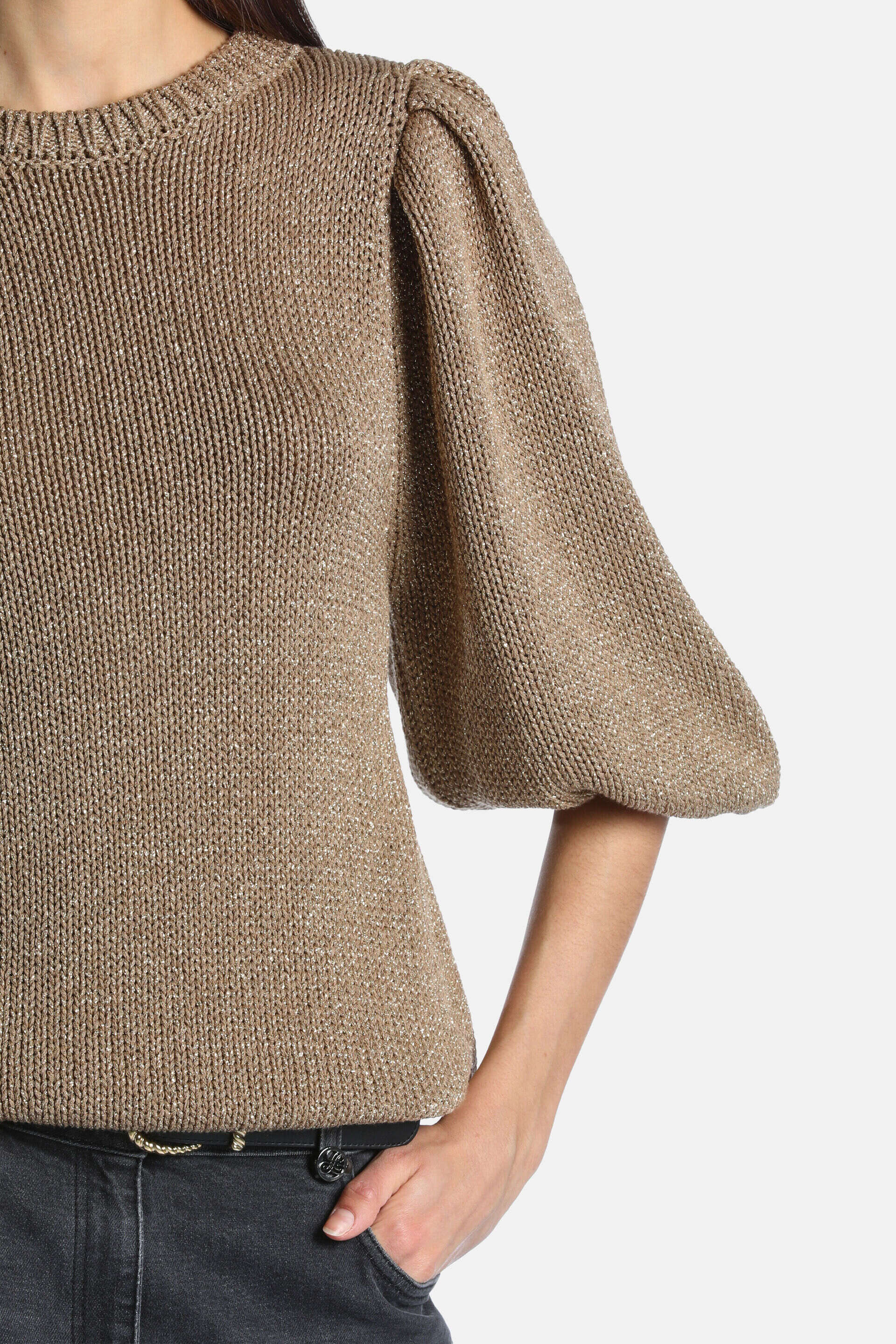 Shimmery gold-toned knit pullover with a crew neck and short, puffed sleeves that widen to the elbow.