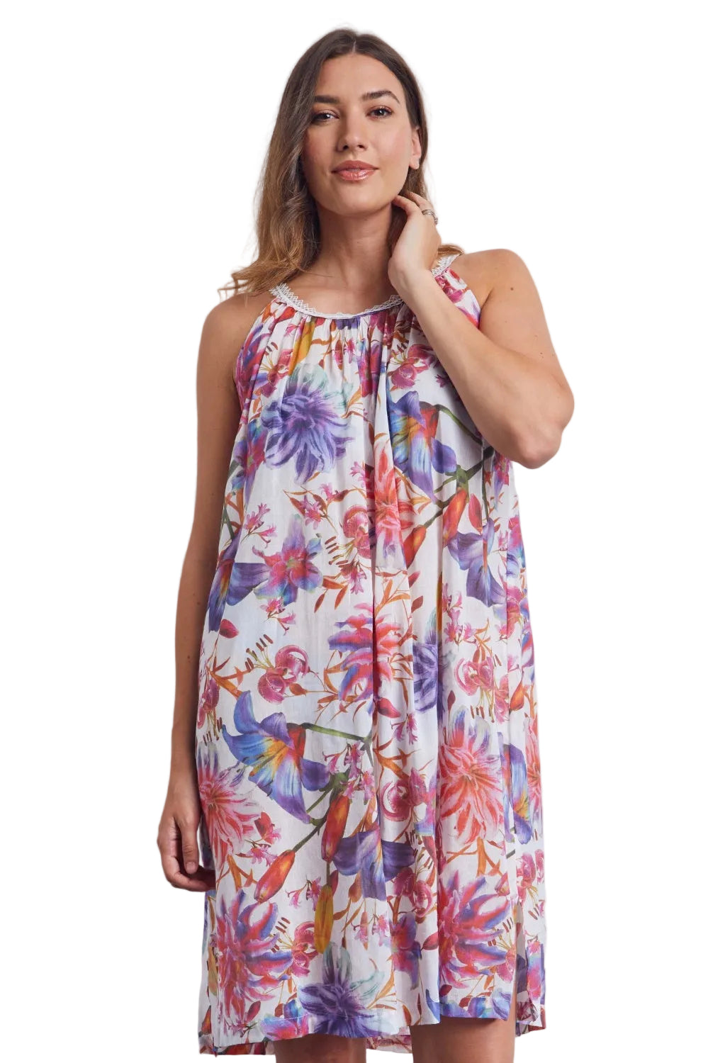 White floral print halter neck dress with purple, pink, and orange flowers and a delicate white trim at the neckline.
