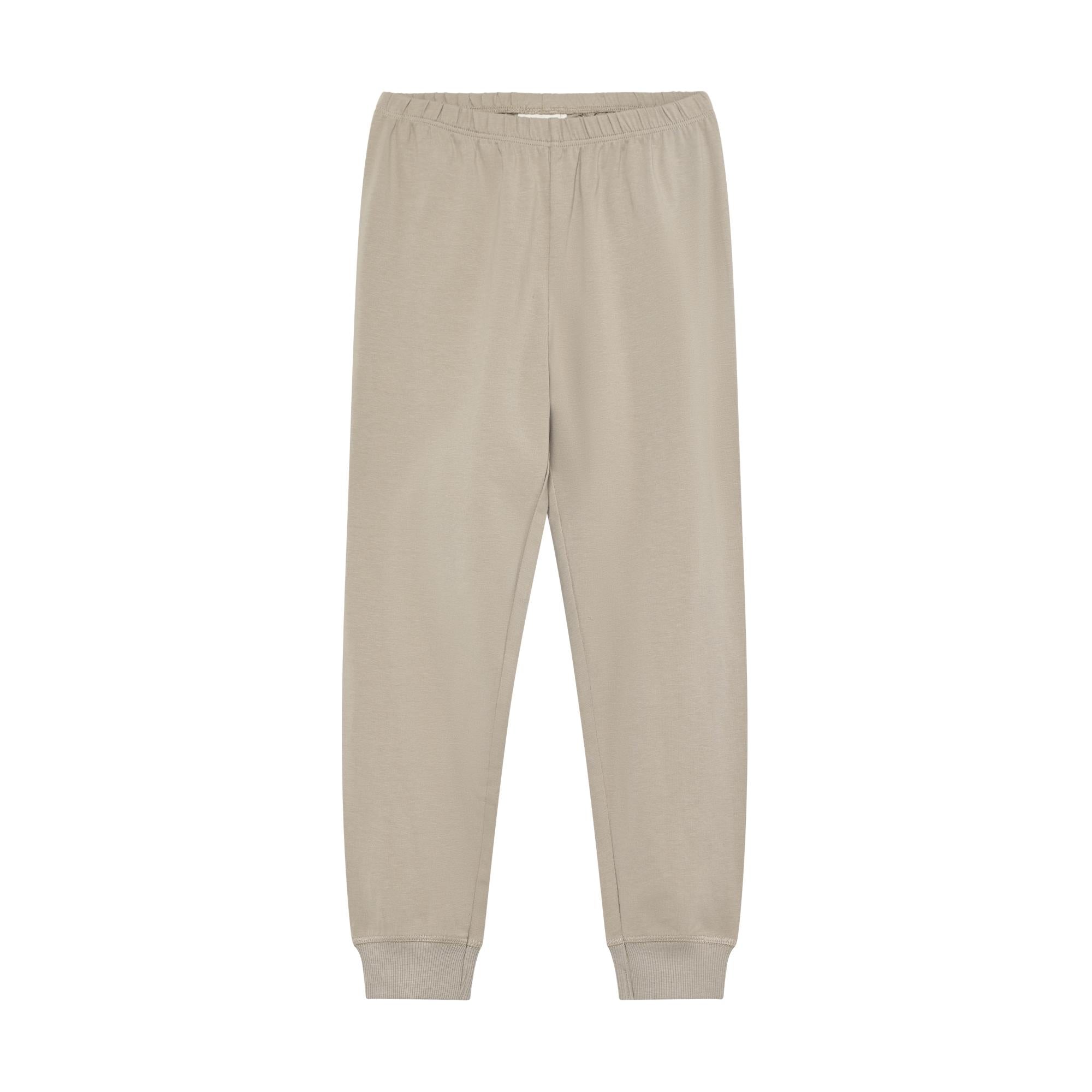 Taupe pajama bottoms with an elasticated waist and ribbed cuffs at the ankles, made from a soft knit fabric.
