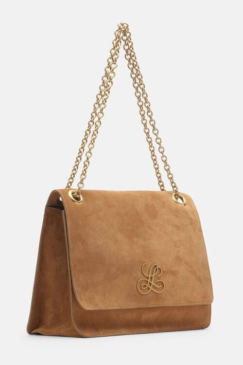 Caramel suede shoulder bag with a flap closure, featuring a gold-toned chain strap and an ornate gold-toned 'L' logo on the f
